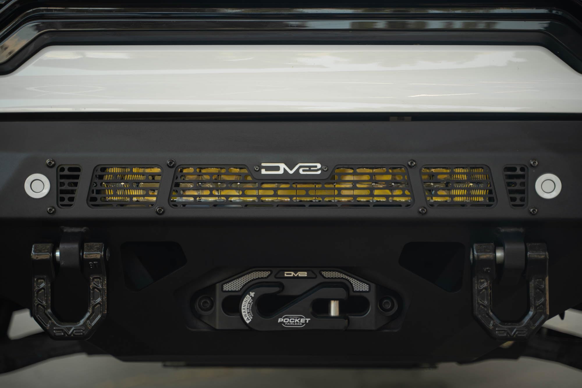 Front Bumper DV8 Spec Series for 2019-2021 GMC Sierra 1500 | Steel Front Skid Plate | One 20" Light Bar Mount | Two 3" Pod Light Mounts | Heavy-Duty Winch Mount | 2 D-Ring Mounts | Powder Coated Black