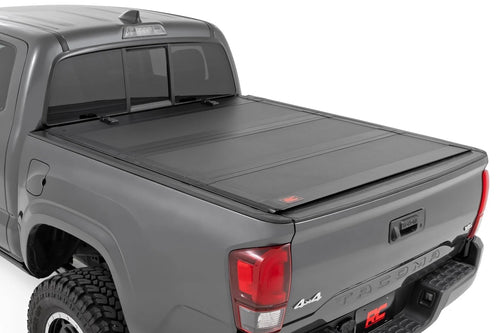 Rough Country Hard Tri-Fold Truck Bed Flip Up Tonneau Cover for Toyota Tacoma (2005-2015) - Fits 6' Bed, All-Weather, Flush Aluminum Panels
