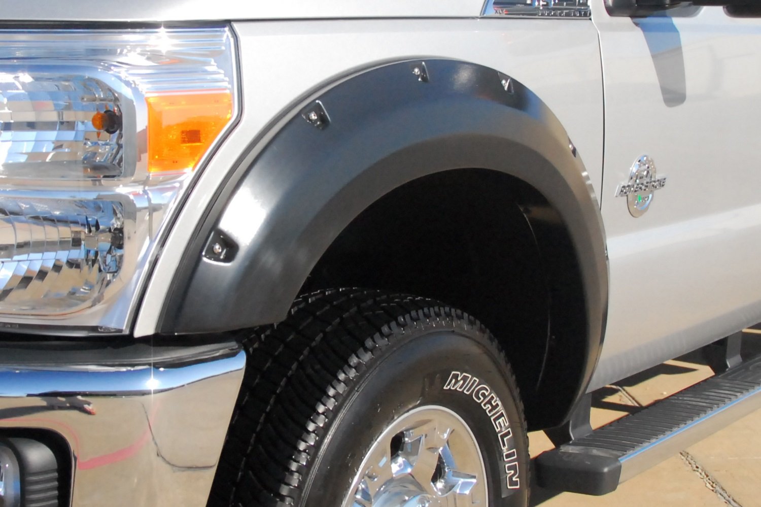 Lund RX314SA Elite Series Black Rivet Style Standard Front Fender Flare - 2 Piece RealTruck