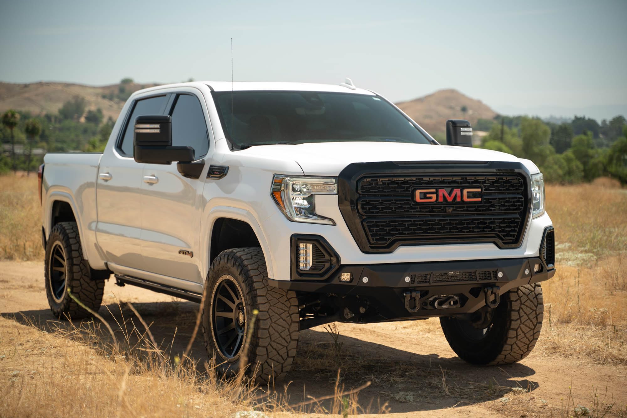 Front Bumper DV8 Spec Series for 2019-2021 GMC Sierra 1500 | Steel Front Skid Plate | One 20" Light Bar Mount | Two 3" Pod Light Mounts | Heavy-Duty Winch Mount | 2 D-Ring Mounts | Powder Coated Black