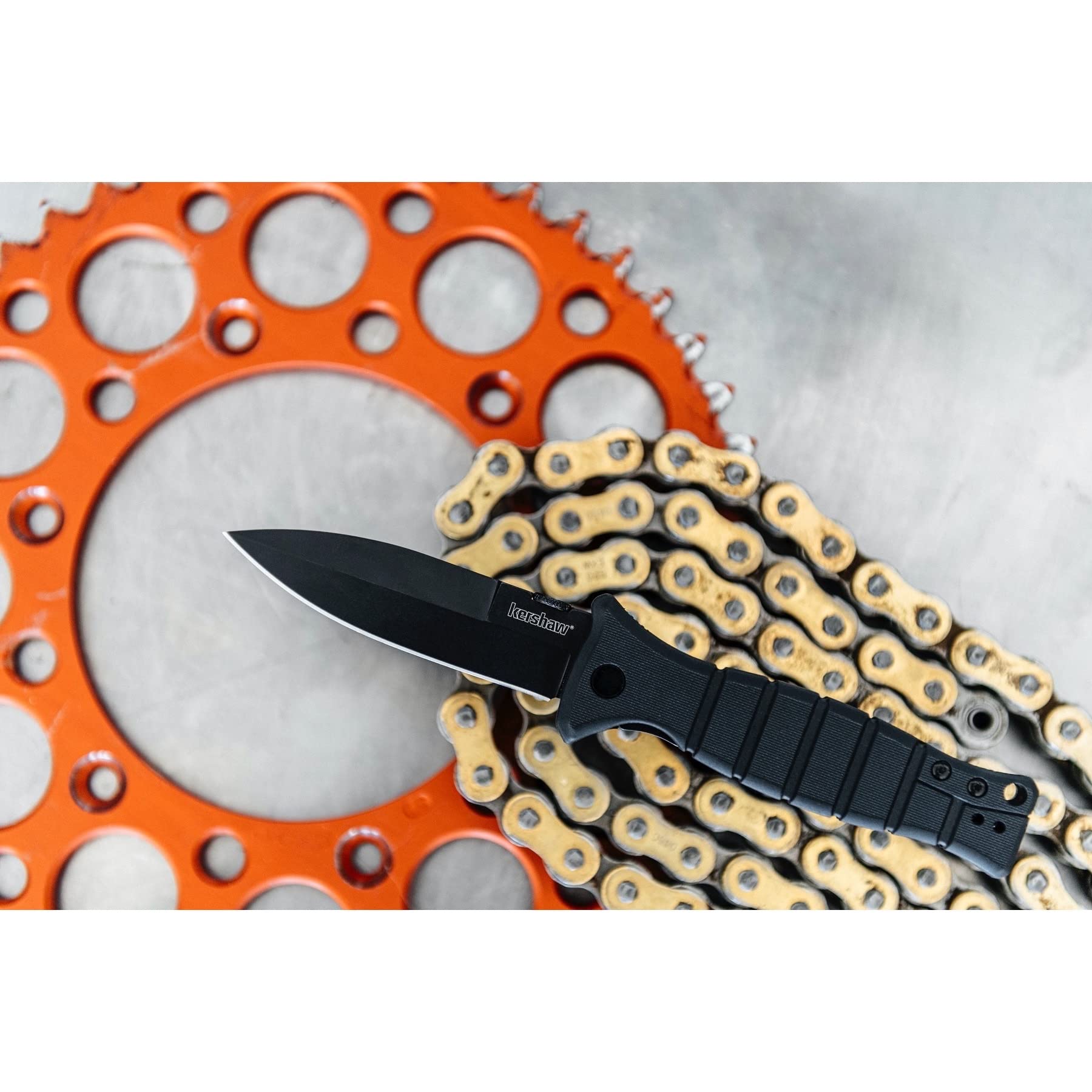 Kershaw Pocketknife XCOM Military-Style; 3.6-inch Black-Oxide Coated Blade and 8Cr13MoV Steel, Spearpoint Blade, Sharpened One Side, and Glass Filled Nylon Handle, Manual Open, Reversible Pocketclip