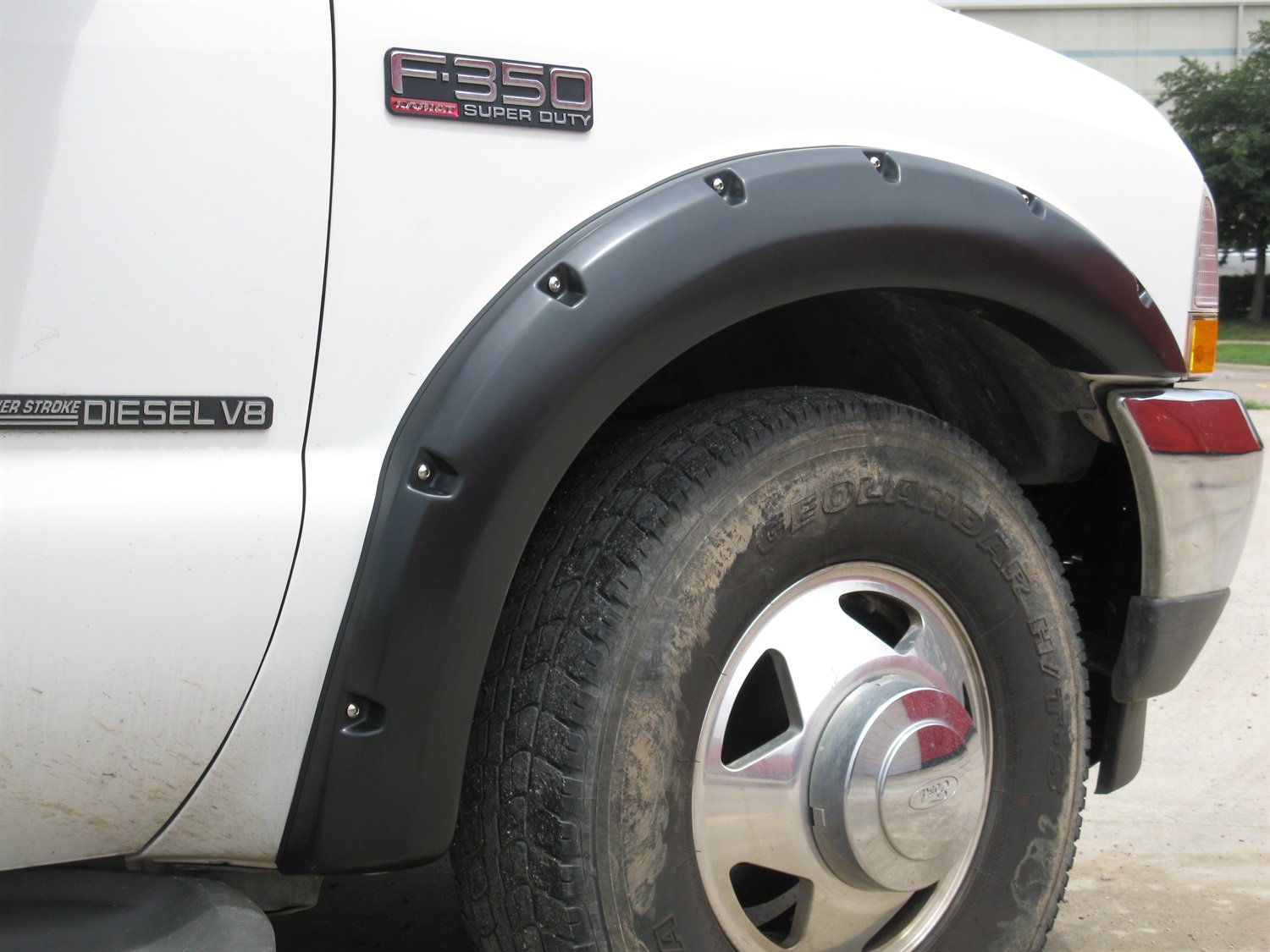 Lund Elite Series RX311TA Black Rivet Style Textured Front Fender Flare - 2 Piece