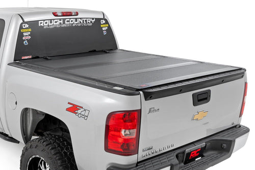 Rough Country Hard Tri-Fold Truck Bed Flip Up Tonneau Cover for Chevy Silverado and GMC Sierra 1500 (2007-2013) - Fits 5'9 (69.3") Bed with Rail Caps