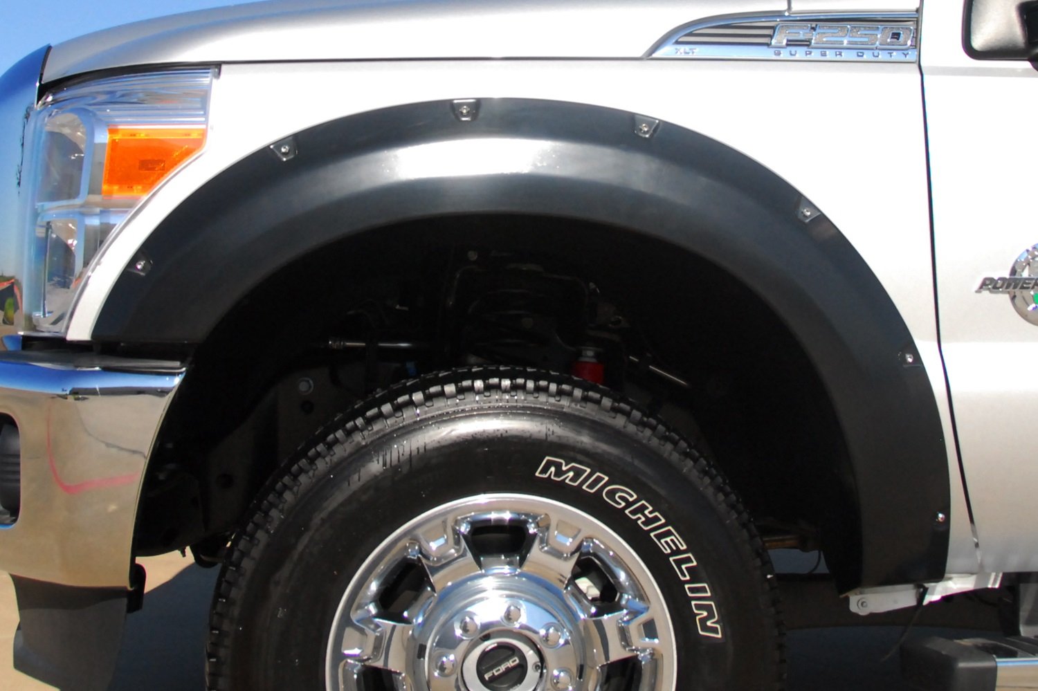 Lund Elite Series RX314TA Black Rivet Style Textured Front Fender Flare - 2 Piece