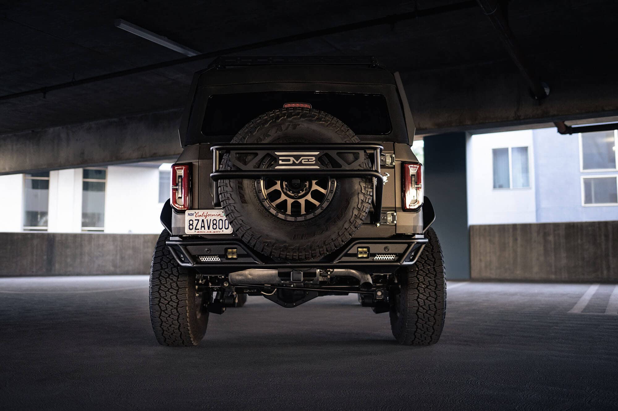 Rear Bumper Competition Series for 2021-2025 Ford Bronco | Fits Up to 37” Spare Tire | Mounts Two Light Mounts that Fit 3” Light Pods | Low Profile | DV8 Offroad