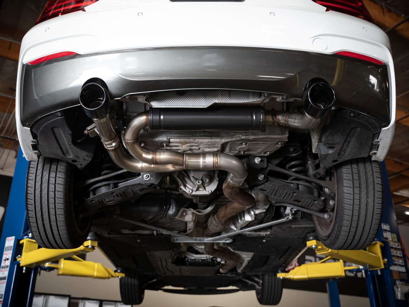 MACH Force-XP aFe Power 49-36348-B 3 IN to 2-1/2 IN 304 Stainless Steel Axle-Back Exhaust Black