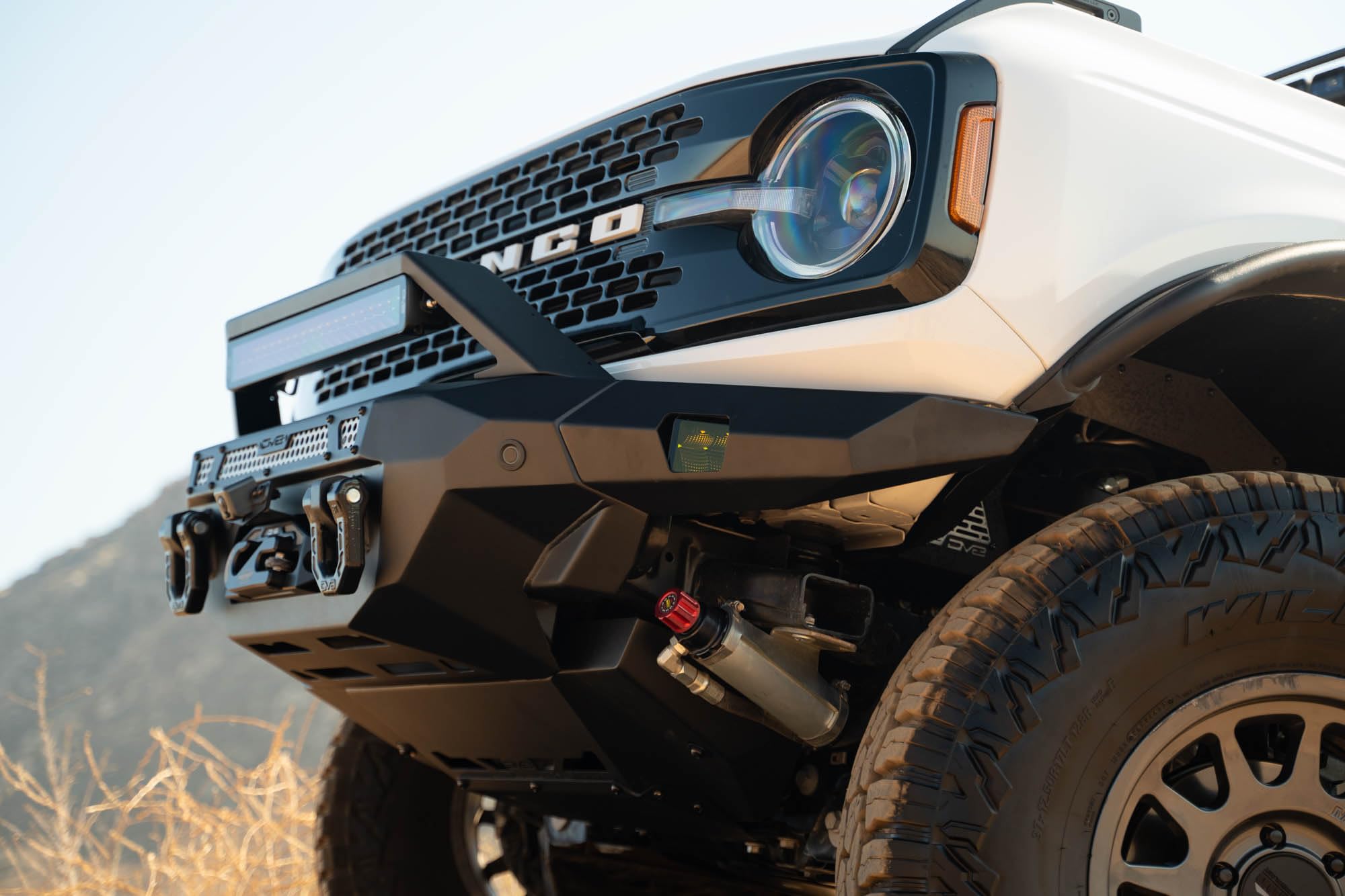 MTO V2 DV8 Front Bumper for 2021-2025 Ford Bronco | Hidden Heavy-Duty Winch Mount | Included Steel Bull Bar | Light Bar & Pod Light Mounts | Two D-Ring Mounts | Micro-Texture Black Powder Coat | Steel