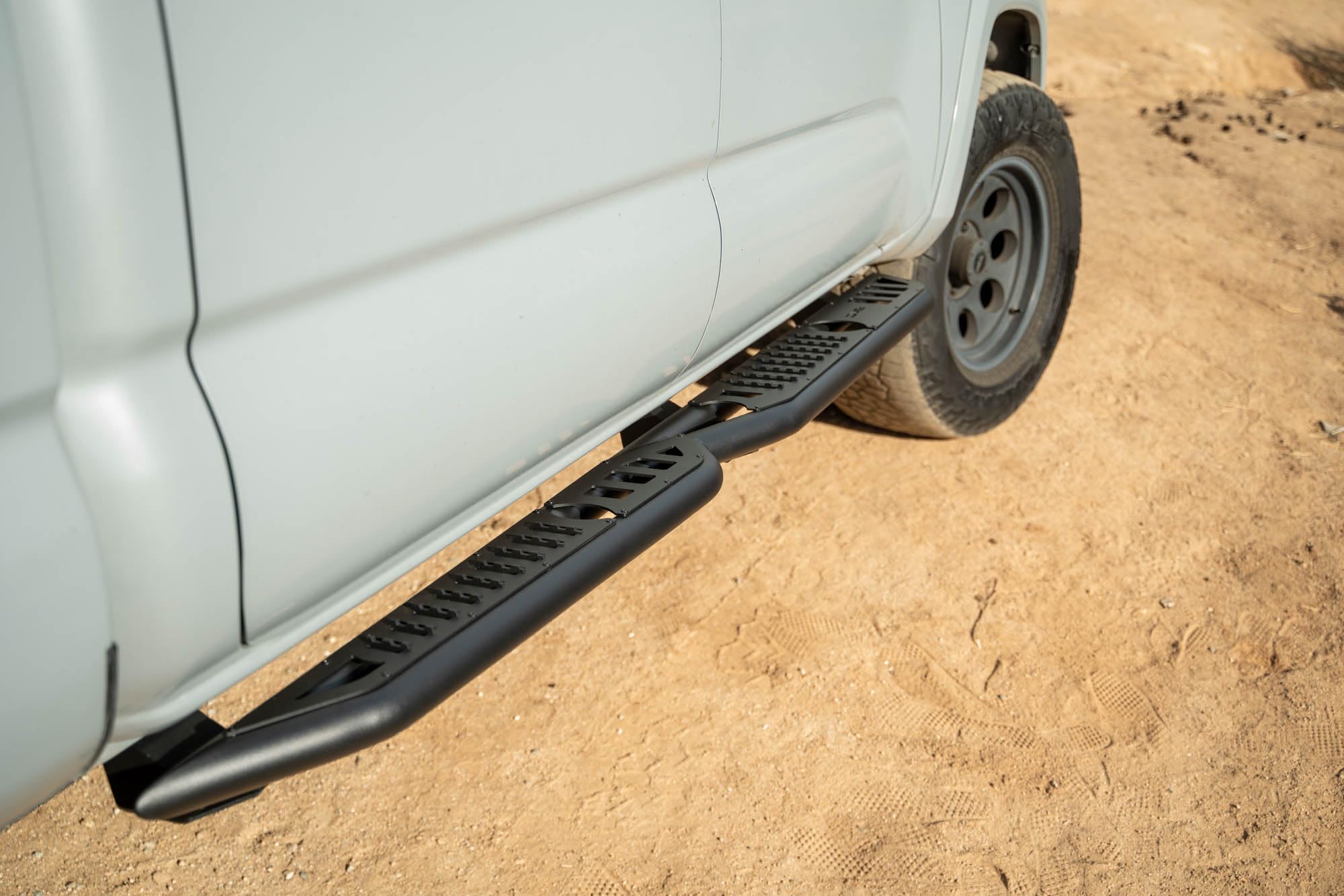 Offroad DV8 OE Plus Side Steps for 2016-2023 Toyota Tacoma Crew Cab | Anti-Slip Design | Mounts to Body/Pinch Weld | Provides Protection from Light Trail Debris | Fully Bolt-On | Powder Coated | Steel