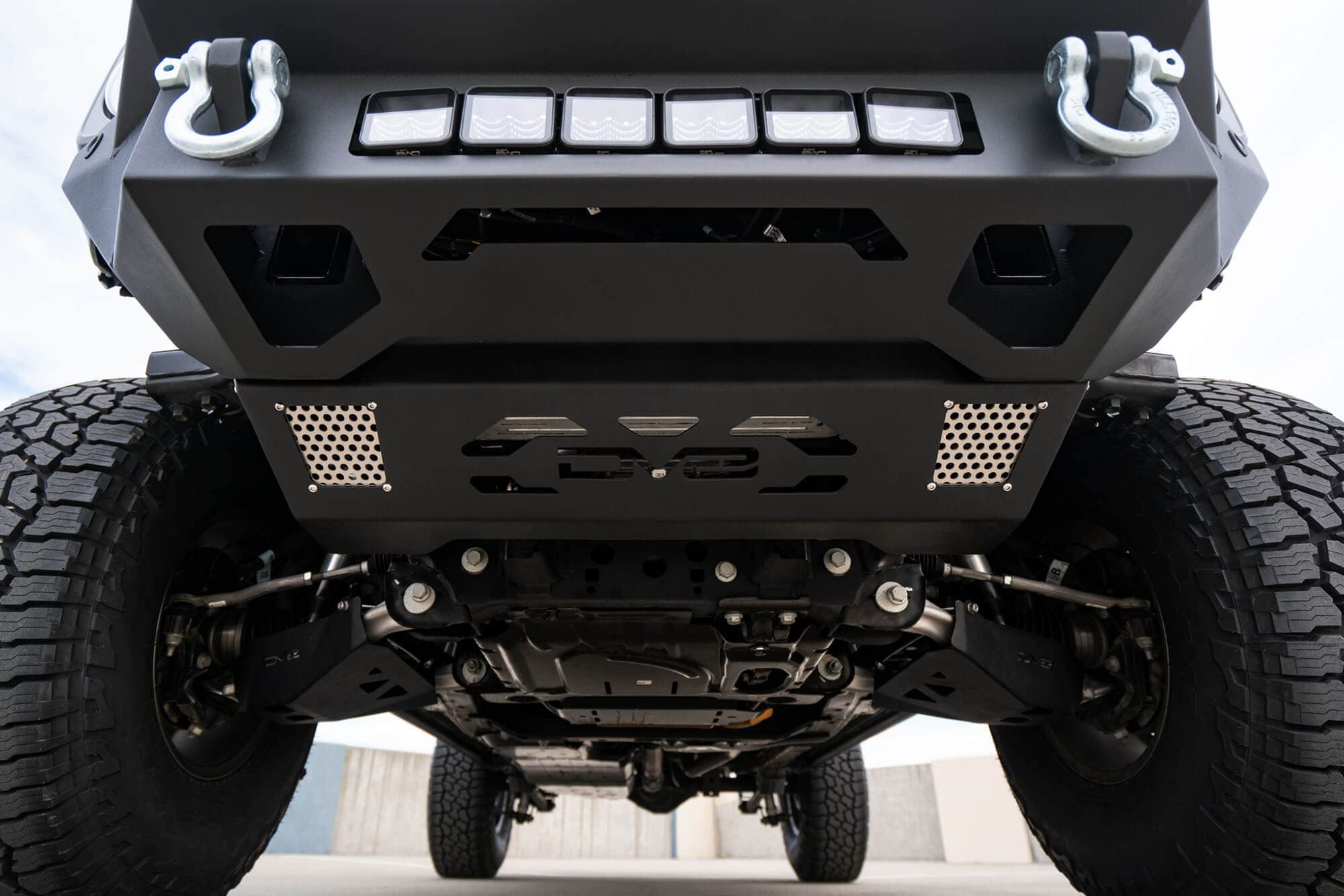 Steel Front Skid Plate DV8 Offroad for 2021-2025 Ford Bronco | Protects Front Underbody | Paintable Aluminum Inserts | Bolt-on Installation | Black Finish