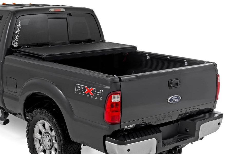 Low-Profile Rough Country Hard Tri-Fold Tonneau Cover for Ford F-250/F-350 Super Duty (1999-2016) - Aluminum Truck Bed Cover, Fits 6'10 Bed (81.9")
