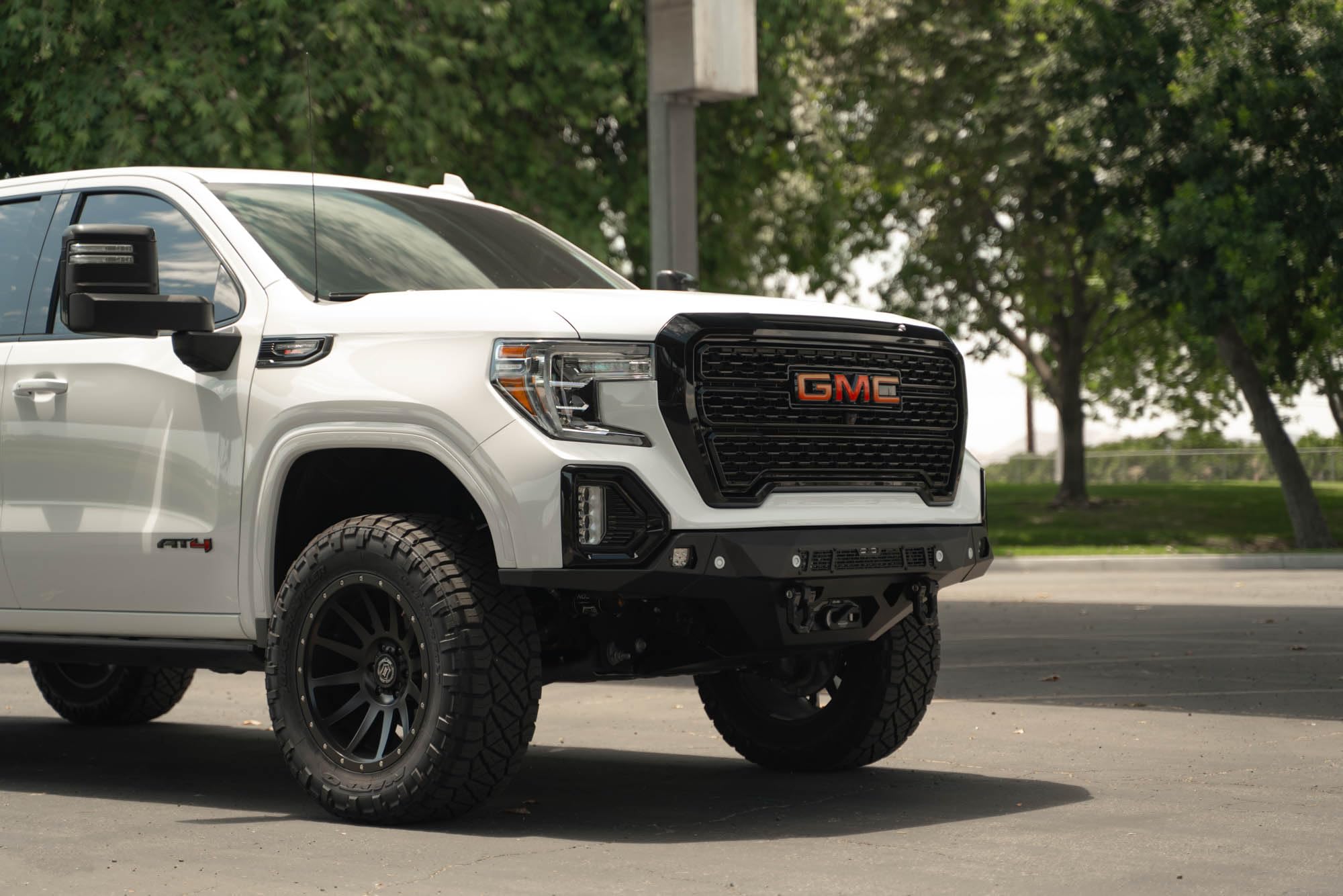 Front Bumper DV8 Spec Series for 2019-2021 GMC Sierra 1500 | Steel Front Skid Plate | One 20" Light Bar Mount | Two 3" Pod Light Mounts | Heavy-Duty Winch Mount | 2 D-Ring Mounts | Powder Coated Black