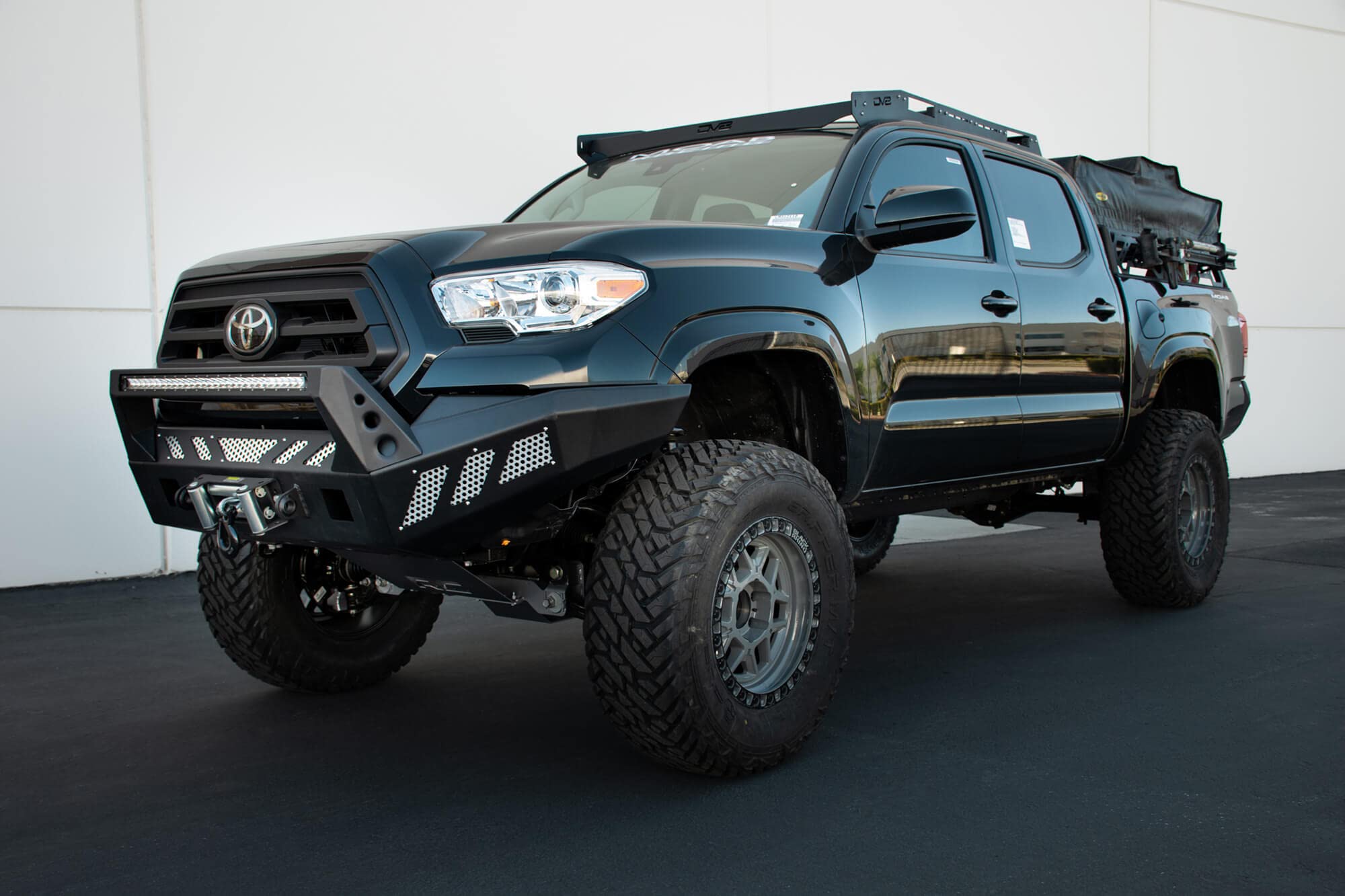 Slotted Aluminum Roof Rack | DV8 Offroad | Compatible with 2016+ Toyota Tacoma Double Cab | Optional Light Mounts | Black Finish