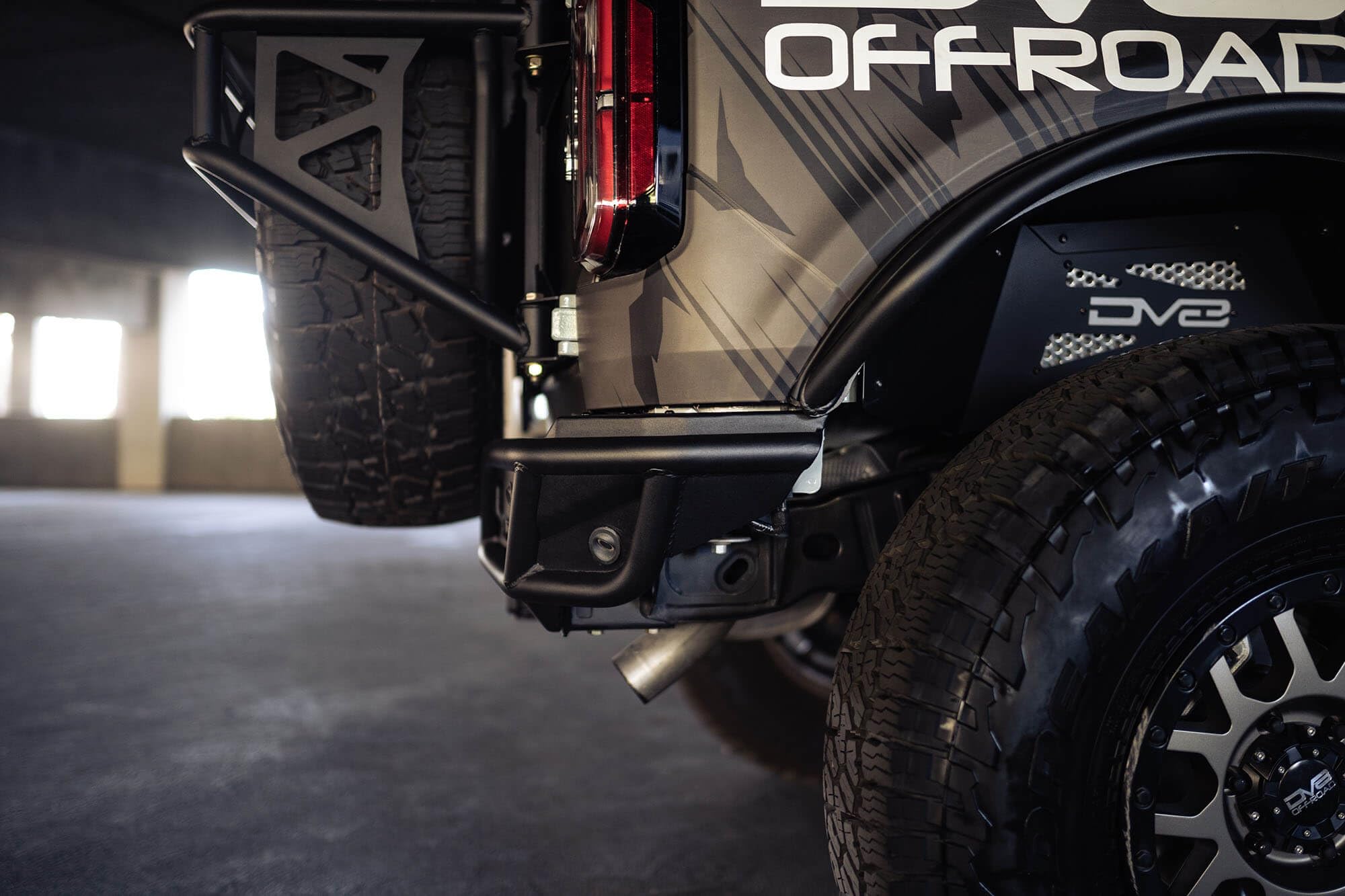 Rear Bumper Competition Series for 2021-2025 Ford Bronco | Fits Up to 37” Spare Tire | Mounts Two Light Mounts that Fit 3” Light Pods | Low Profile | DV8 Offroad