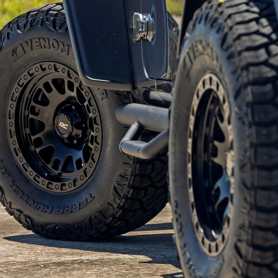 82 Series Rough Country Wheel - 18x9, 8x6.5" Bolt Pattern, 12mm Offset, Semi-Gloss Black One-Piece Aluminum Off-Road Wheel with 8-Spoke Design