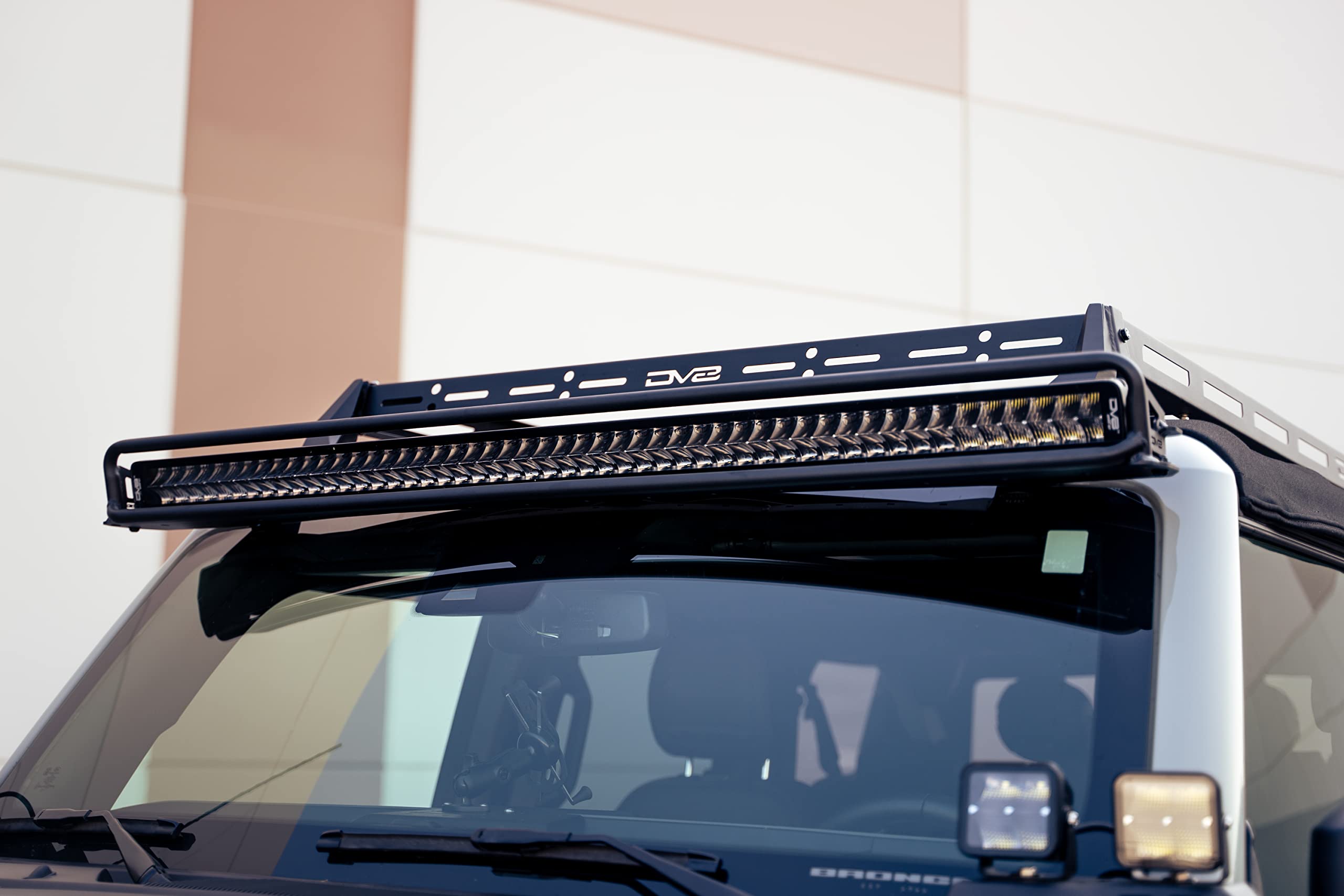 Soft Top Roof Rack DV8 Offroad for 2021-2025 Ford Bronco 4-Door | Bolt-On Installation | Multiple Tie Down Points | 200 lb Capacity | Multiple Accessories