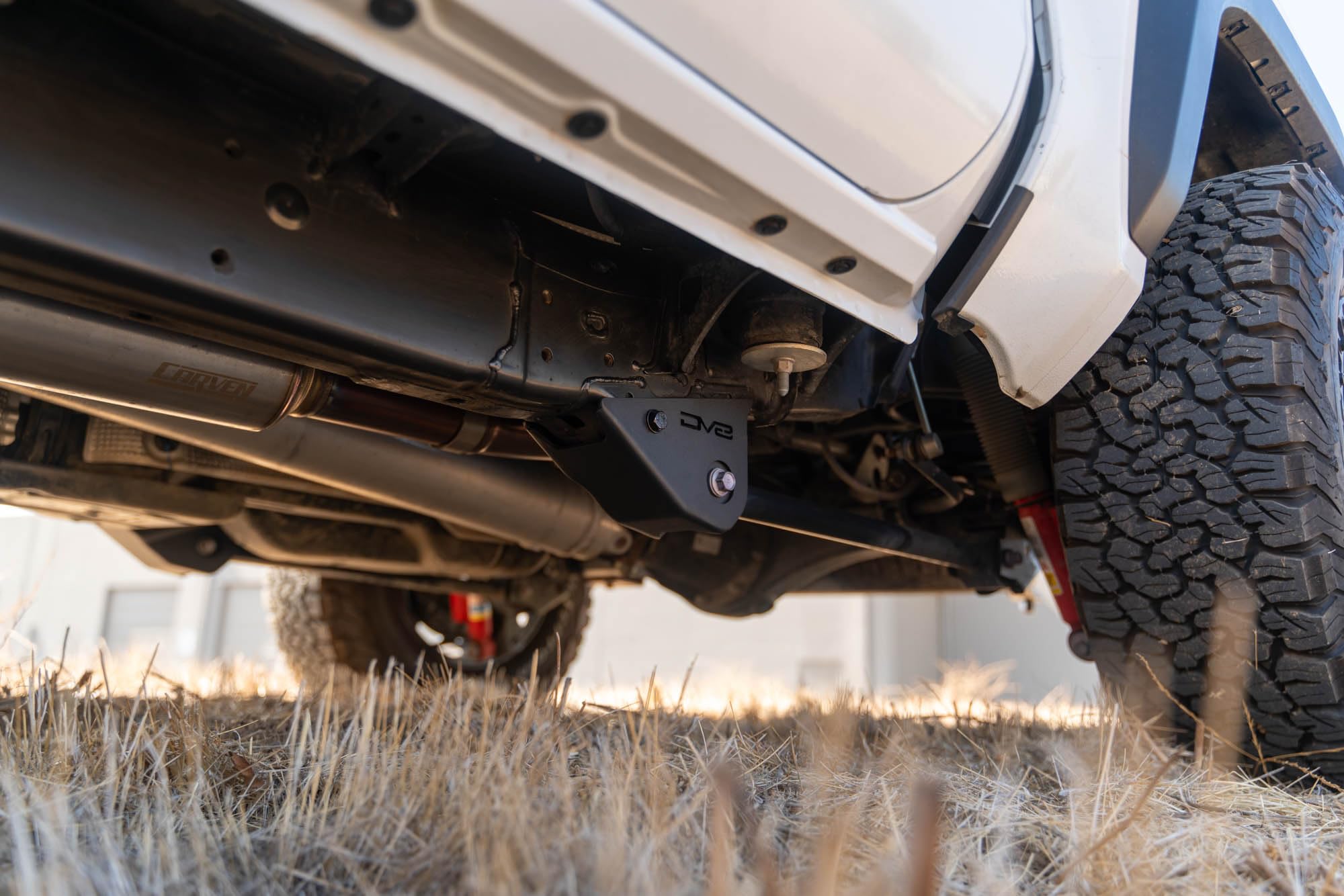 DV8 Offroad Skid Plates for Trailing Arm 2024 Toyota Tacoma | Protects the Vulnerable Trailing Arm Mounts | Helps Prevent Your Truck from Catching on Obstacles | 5mm Steel | Fully Bolt-On Installation