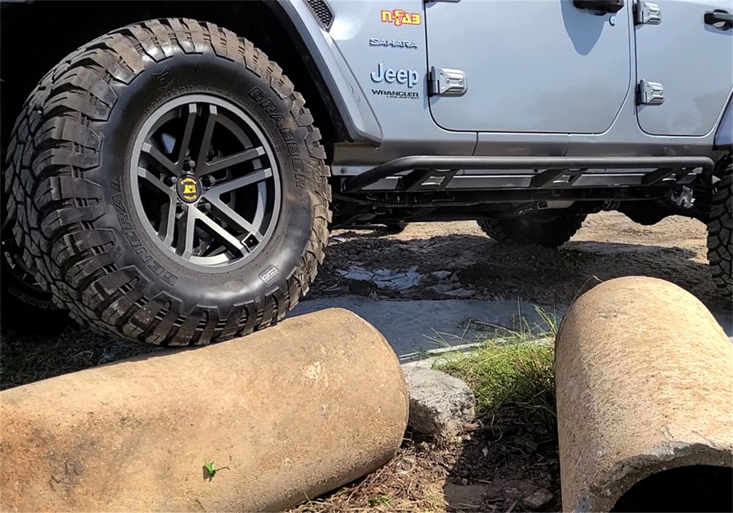 Trail Sliders RealTruck for Jeep Wrangler JLU | Cab Length, Heavy Duty 2" Tubing, Textured Black | TSJ184-TX | Fits 2018 - 2025 Jeep Wrangler JL 4 Door