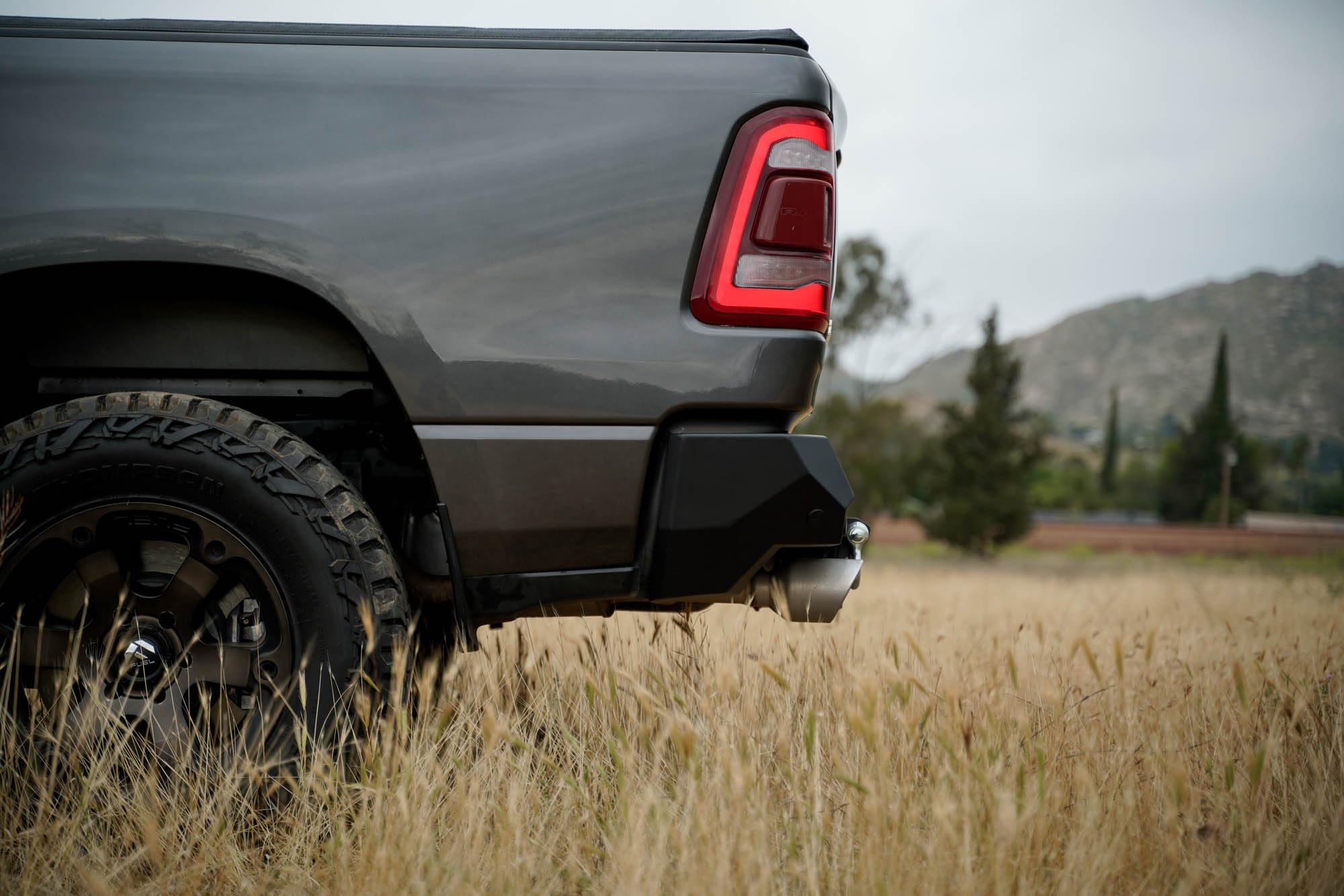 DV8 Offroad Rear Bumper Spec Series Compatible with 2019-2024 Ram 1500 Single and Dual Exhaust Models | Mount two 3" Pod Lights | Recovery Points | Fully Bolt-On | Powder Coated Finish
