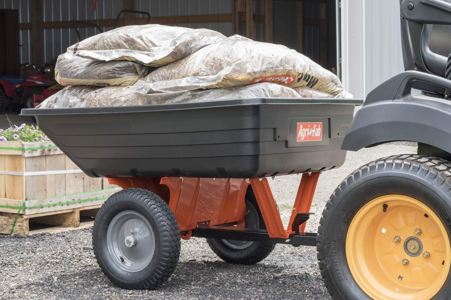 Tow Behind Agri-Fab 45-0533 650 lbs Poly Dump Cart, 10 CU. FT.; Lawn & Garden Trailer for Lawn Mowers, 16" Pneumatics Tires, Easy to Use Foot Pedal Dumping Lever