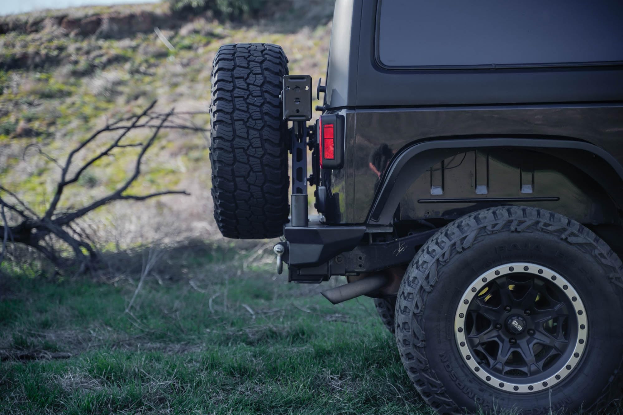 DV8 Offroad Spare Tire Carrier for 2007-2018 Jeep Wrangler JK | MTO Rear Bumper Mounts Only to DV8 Offroad’s MTO Rear Bumper (RBJK-13) | Will Fit Most 38x13.50 Tires