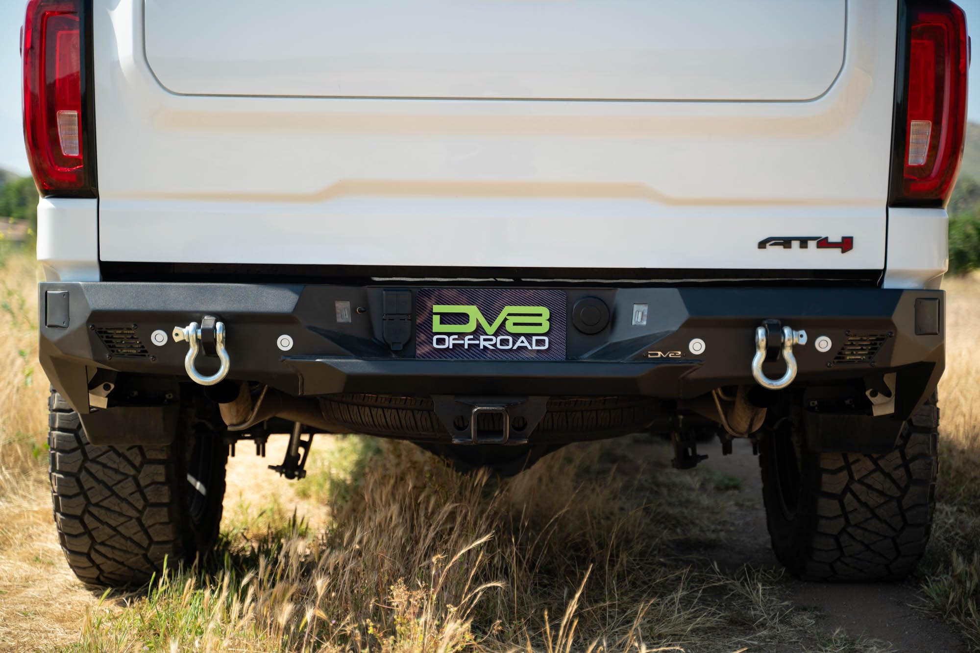 DV8 Offroad Rear Bumper Spec Series Compatible with 2019-2024 GMC Sierra & Chevy Silverado 1500 | Two 3-inch Pod Light Mounts | Integrated D-Ring Mounts | Fully Bolt-On Installation