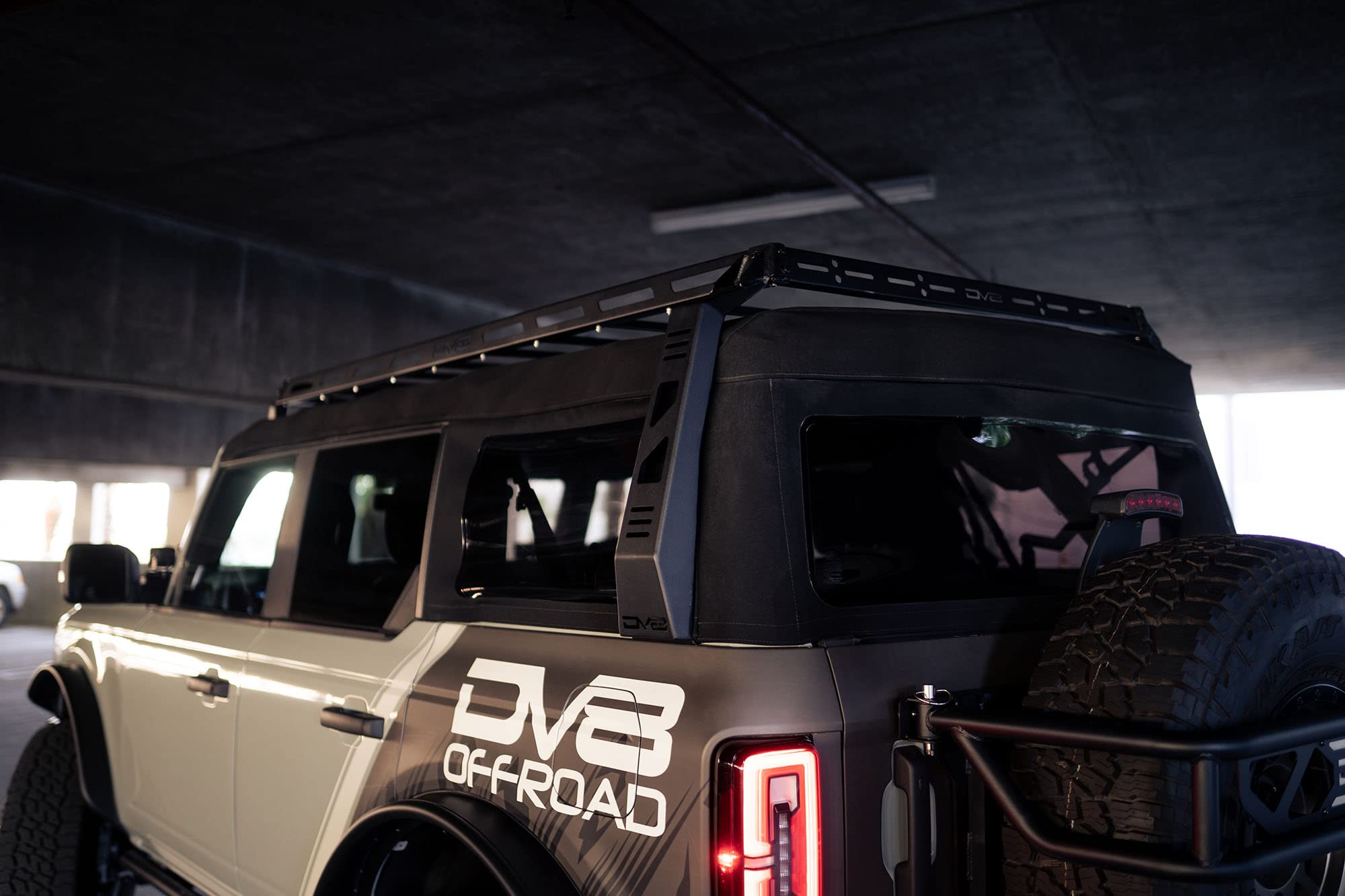 Soft Top Roof Rack DV8 Offroad for 2021-2025 Ford Bronco 4-Door | Bolt-On Installation | Multiple Tie Down Points | 200 lb Capacity | Multiple Accessories