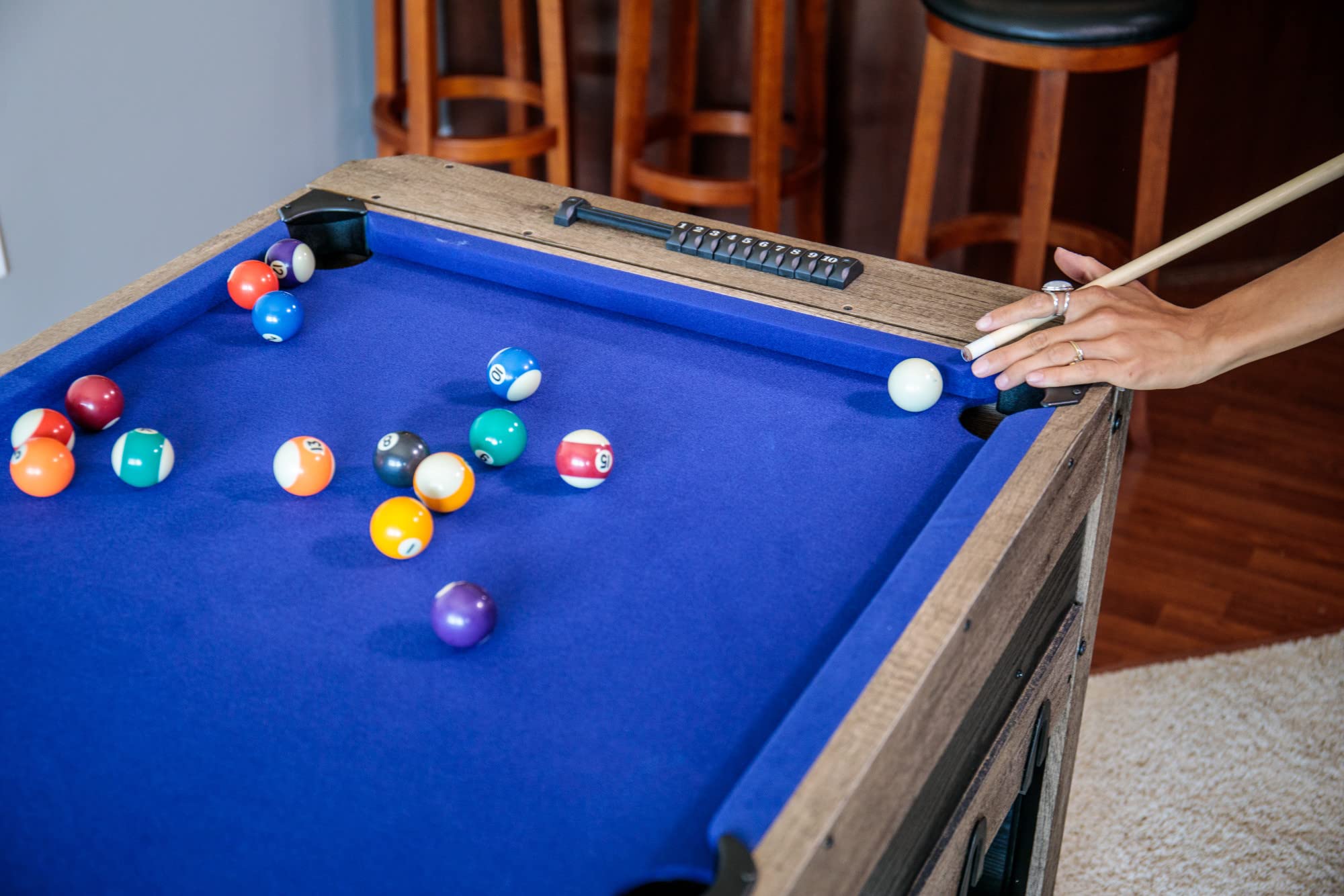 56” Triumph 4-in-1 Swivel Multi-Game Table - Air Hockey, Billiards, Foosball, Ping Pong - Rustic Wood Grain Finish