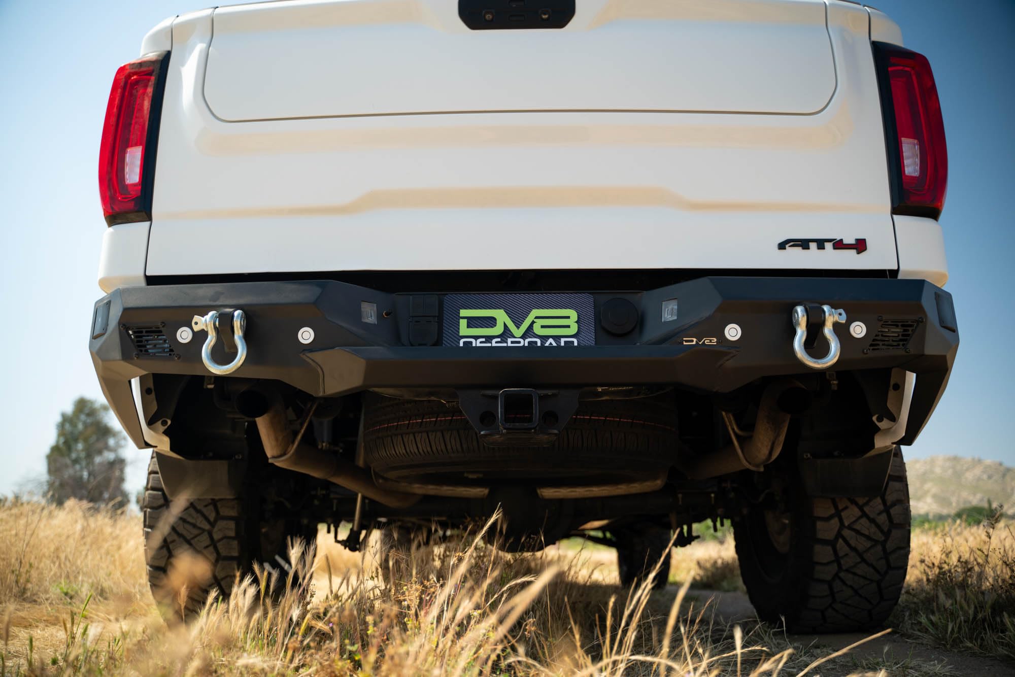 DV8 Offroad Rear Bumper Spec Series Compatible with 2019-2024 GMC Sierra & Chevy Silverado 1500 | Two 3-inch Pod Light Mounts | Integrated D-Ring Mounts | Fully Bolt-On Installation