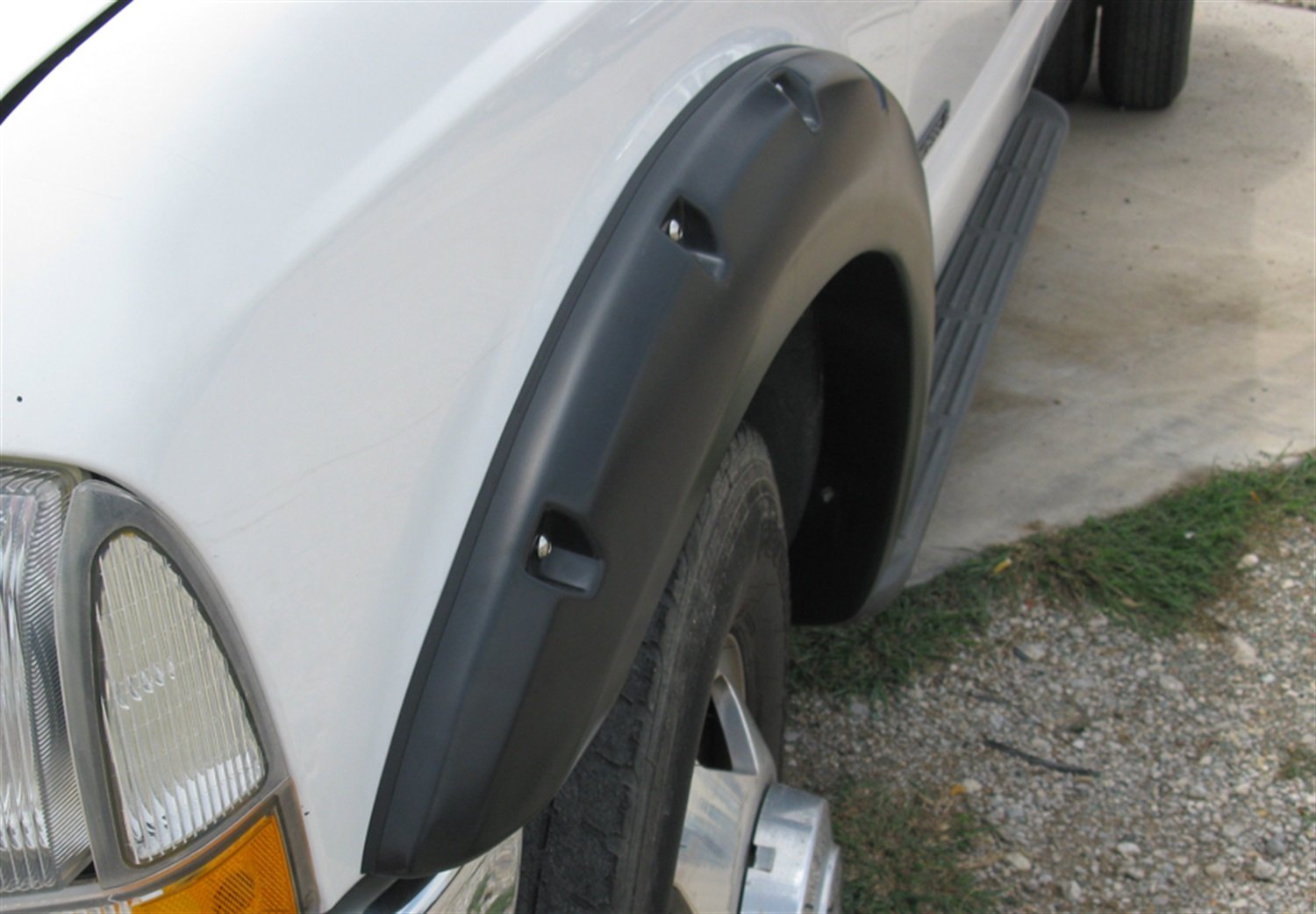Lund Elite Series RX311T Black Rivet Style Textured Front and Rear Fender Flare - 4 Piece