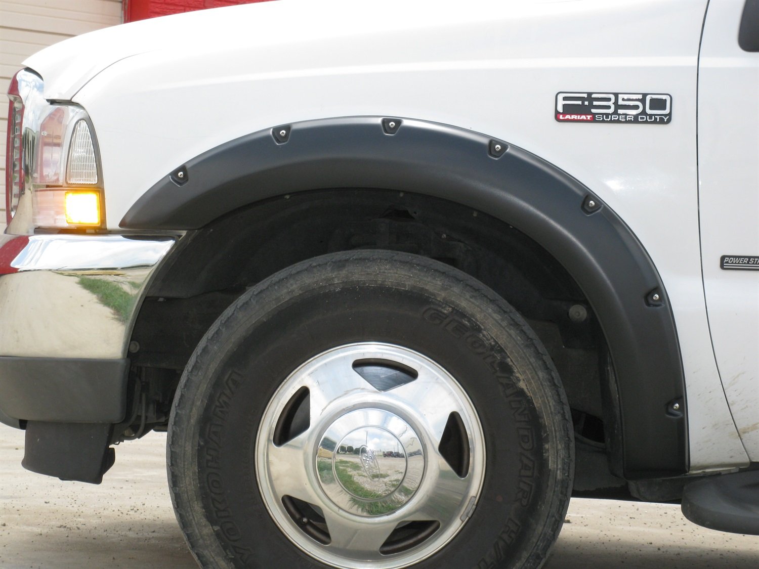 Lund Elite Series RX311T Black Rivet Style Textured Front and Rear Fender Flare - 4 Piece