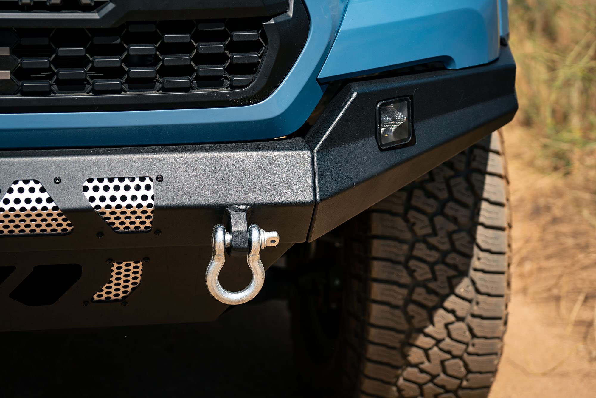 MTO Series DV8 Offroad Front Bumper for 2016 - Current Tacoma | Low Profile | Auxiliary Light and D-ring Mounts | Paintable Mesh Panels | 3pc Steel Construction | FBTT1-04
