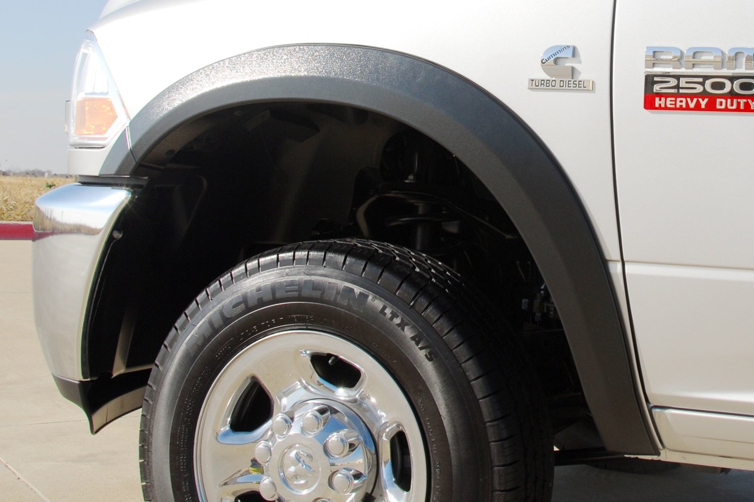 Lund SX205TA Elite Series RealTruck Black Sport Style Textured Front Fender Flare - 2 Piece