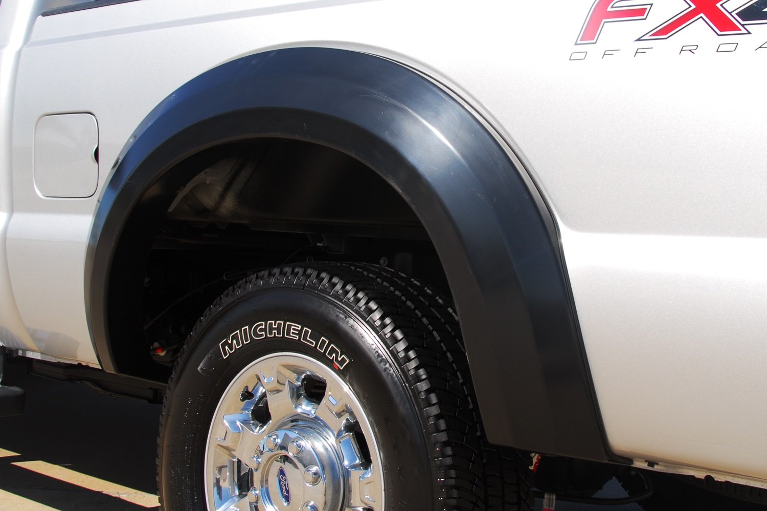 Lund Elite Series EX314T Black Extra Wide Style Textured Front and Rear Fender Flare - 4 Piece