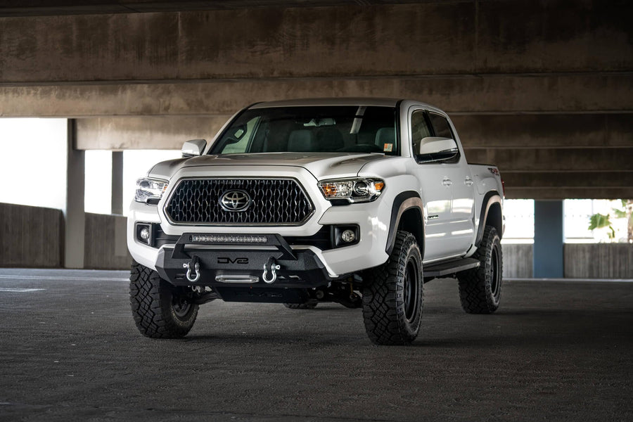 FBTT1-05 DV8 Offroad | Front Bumper fits 2016-2021 Toyota Tacoma | Center Inlay Only | Winch Mount Included | Bull Bar | Strategic Airflow Cutouts | Welded Light Tabs, Black