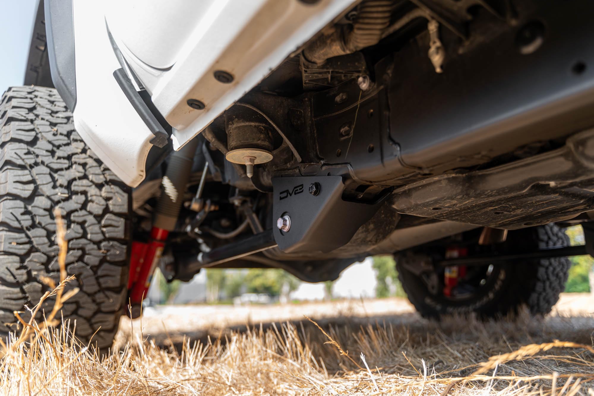DV8 Offroad Skid Plates for Trailing Arm 2024 Toyota Tacoma | Protects the Vulnerable Trailing Arm Mounts | Helps Prevent Your Truck from Catching on Obstacles | 5mm Steel | Fully Bolt-On Installation