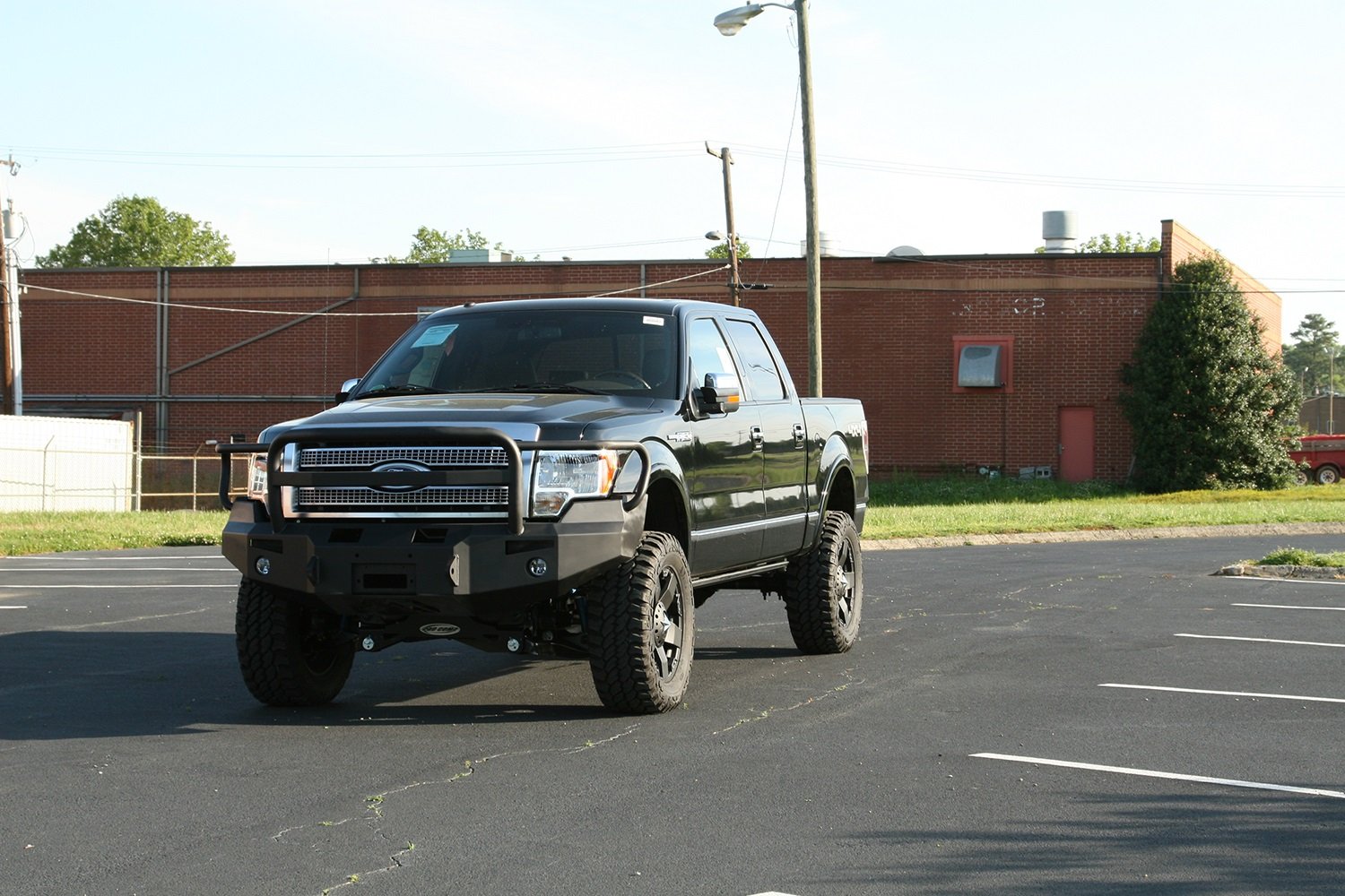Fab Fours Premium Heavy Duty Winch Front Bumper FF09-H1950-B Uncoated/Paintable w/Full Grill Guard Incl. 1 in. D-Ring Mounts/Light Cut-Outs w/Hella 90mm Fog Lamps And 60mm Turn Signals Heavy Duty Winch Front Bumper
