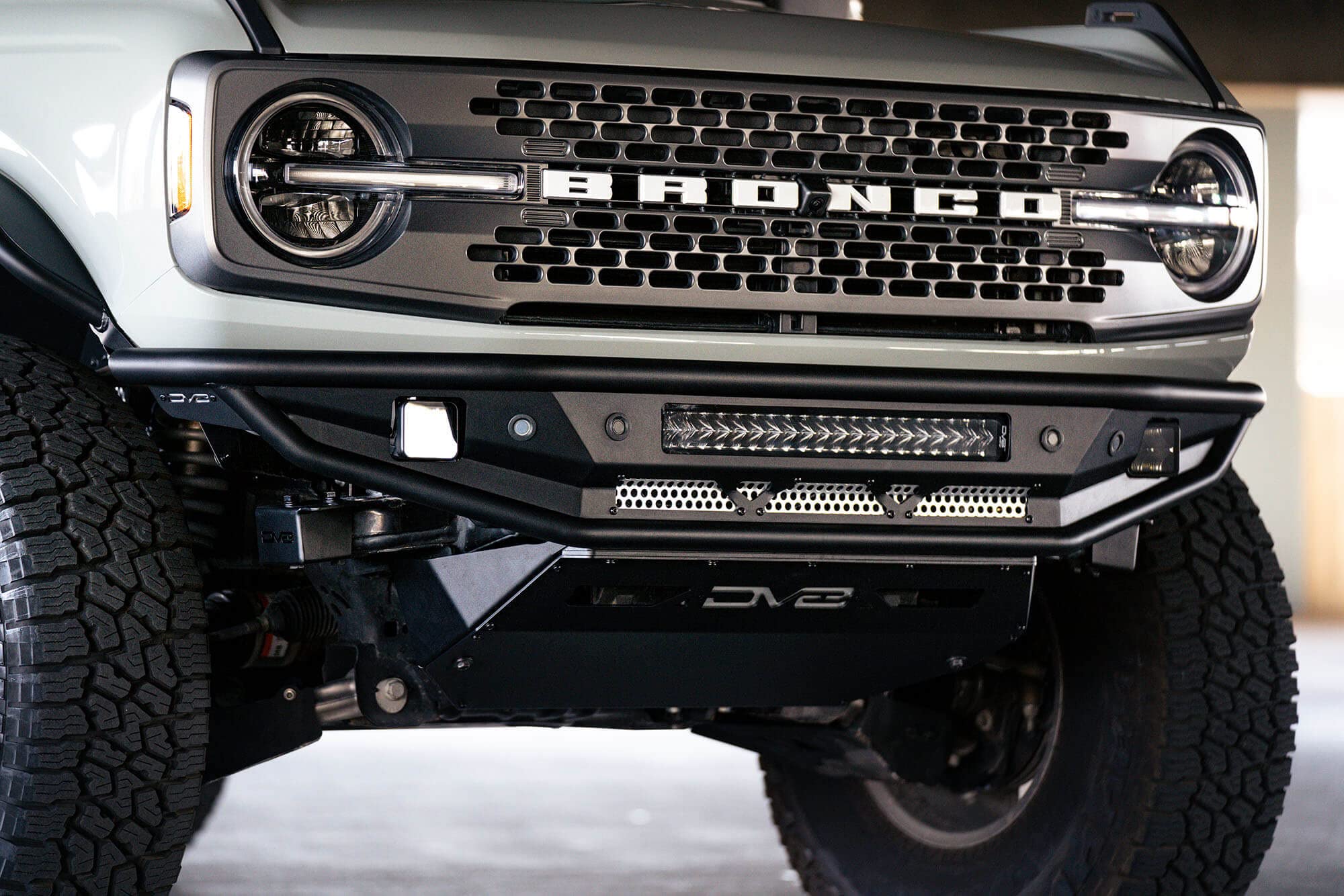 Front Bumper Competition Series for 2021-2025 Ford Bronco | Prerunner-style Design | Includes Steel Skid Plate with Side Gussets | Mounts LED Pod Lights & Dual Row LED Light Bar | DV8 Offroad