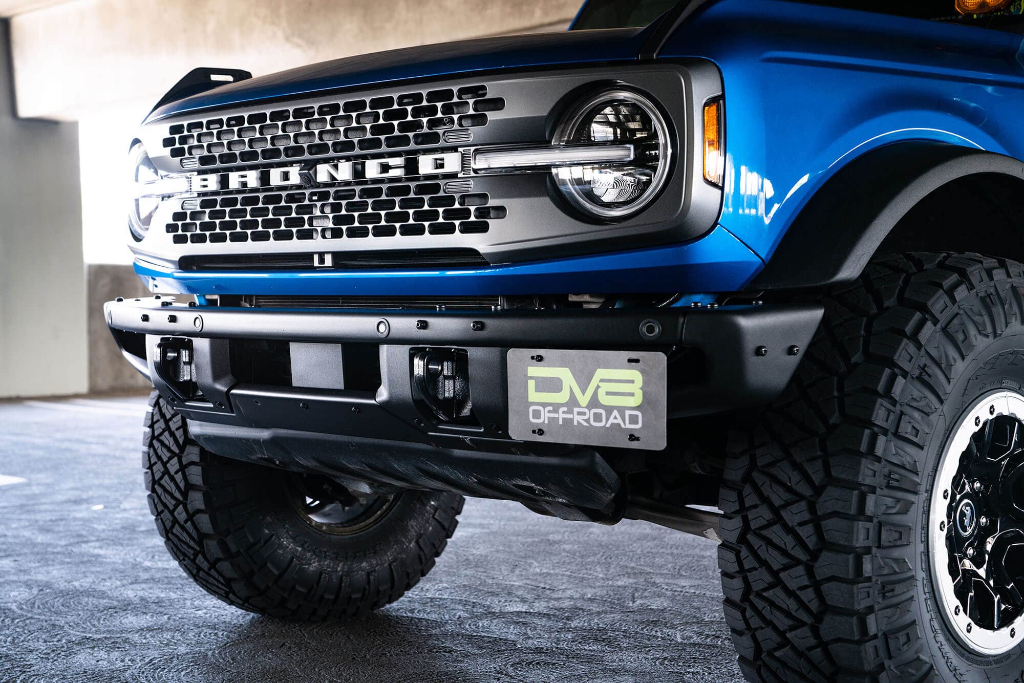 License Plate Relocation Bracket DV8 Offroad for 2021-2024 Ford Bronco | Compatible with The Factory Steel Modular Front Bumper | Side Mounted | Does Not Block Grille