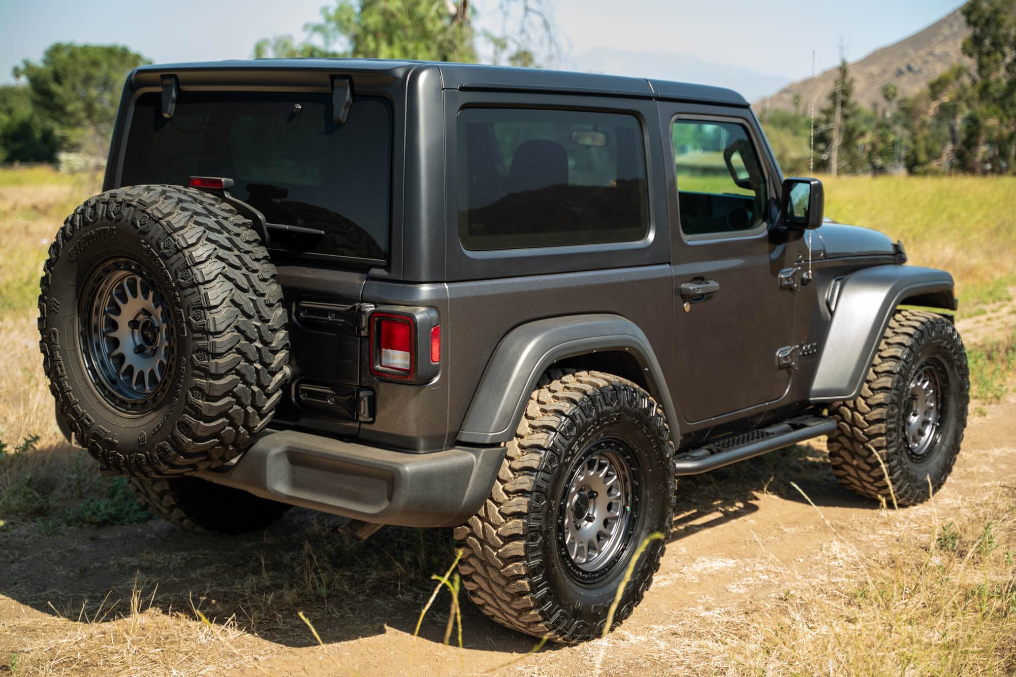OE Plus DV8 Side Steps for 2018-2025 2-Door Jeep Wrangler JL | Gripped Top Plates to Prevent Slippage | Multi-Mount Design for Stability | Fully Bolt-On | Micro-Texture Black Powder Coat Finish