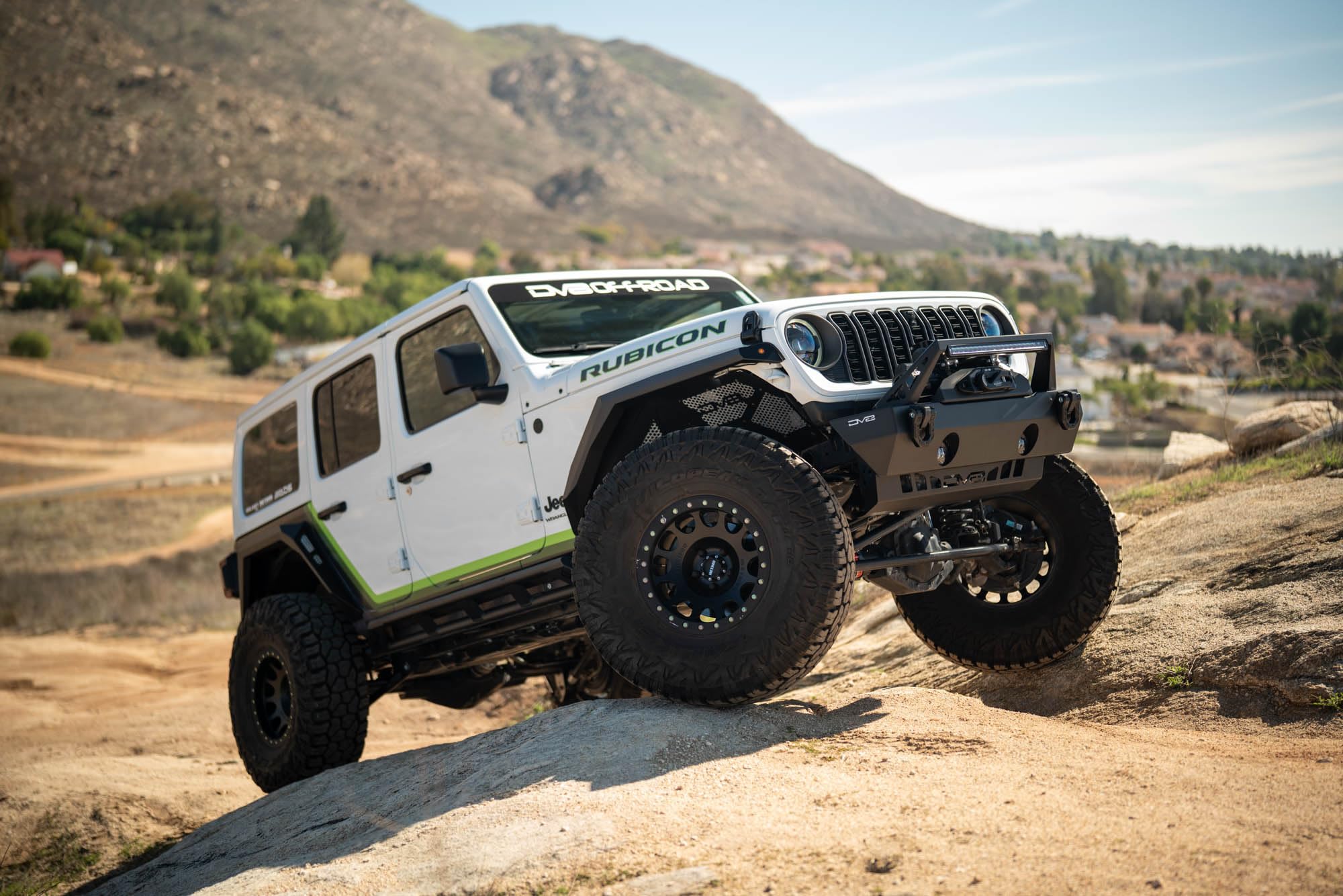 Armor Fender Flares DV8 Offroad for 2018-2025 Jeep Wrangler JL | Narrow Width | Rigid Armor-Plated Steel Design | (2) Amber Turn Signals | Paintable Mesh Aluminum Accent Panels | Powder Coated Black