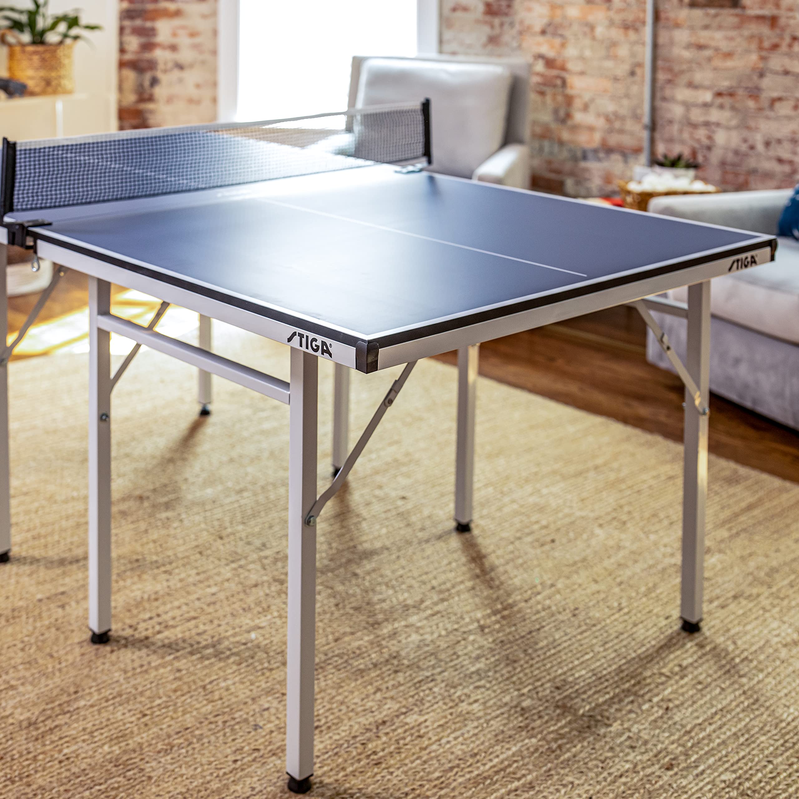 Mid-Size Portable STIGA Space Saver Table Tennis Table - Compact Storage Fits in Most Closets – Includes Ping-Pong Net & Post - No Assembly Required