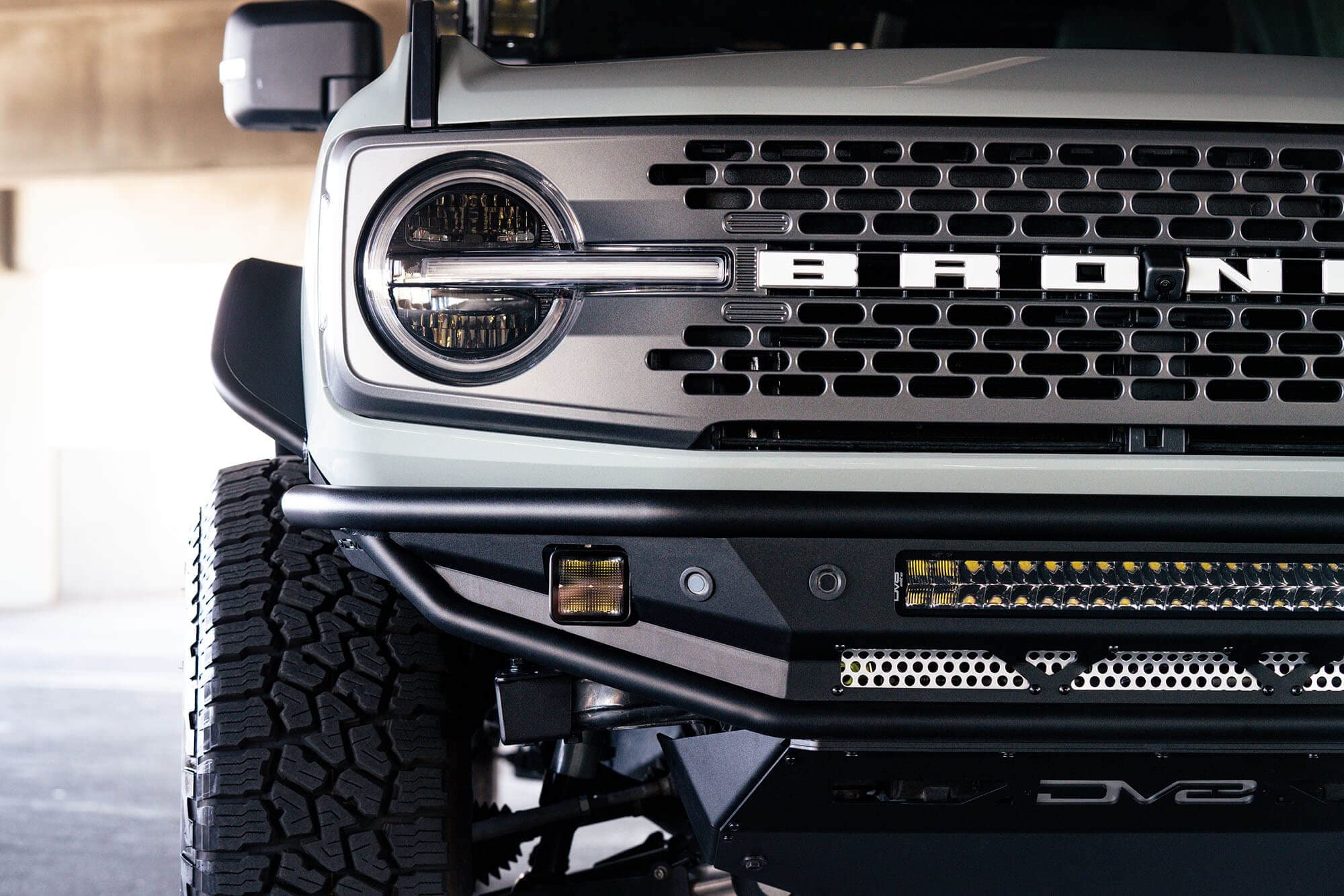Front Bumper Competition Series for 2021-2025 Ford Bronco | Prerunner-style Design | Includes Steel Skid Plate with Side Gussets | Mounts LED Pod Lights & Dual Row LED Light Bar | DV8 Offroad