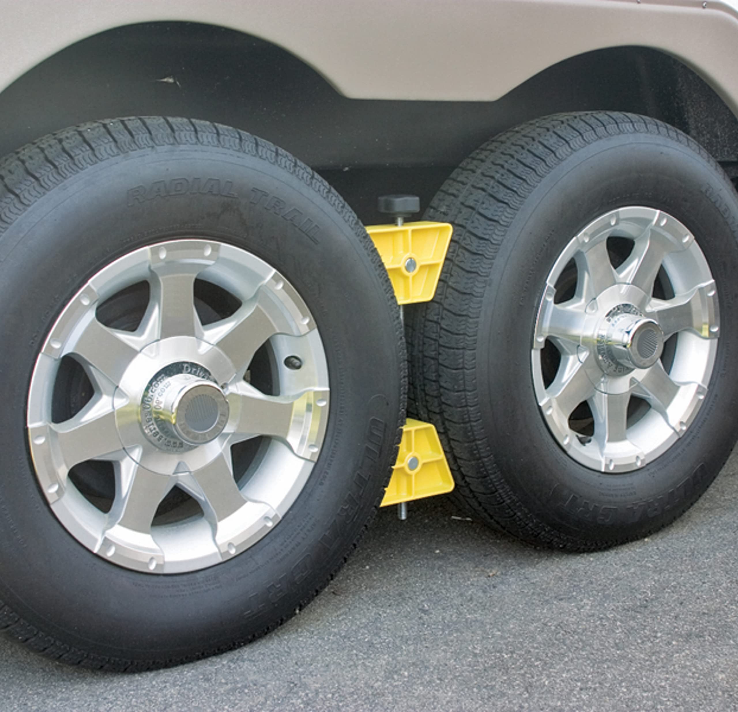 Camco RV Small Wheel Stop - Features a Lightweight Heavy-Duty Design with a Rubber Handle, Prevents Shifting of Trailer Tandem Tires While Parked or Re-Hitching, and Fits 26” to 30” Tires (44652)