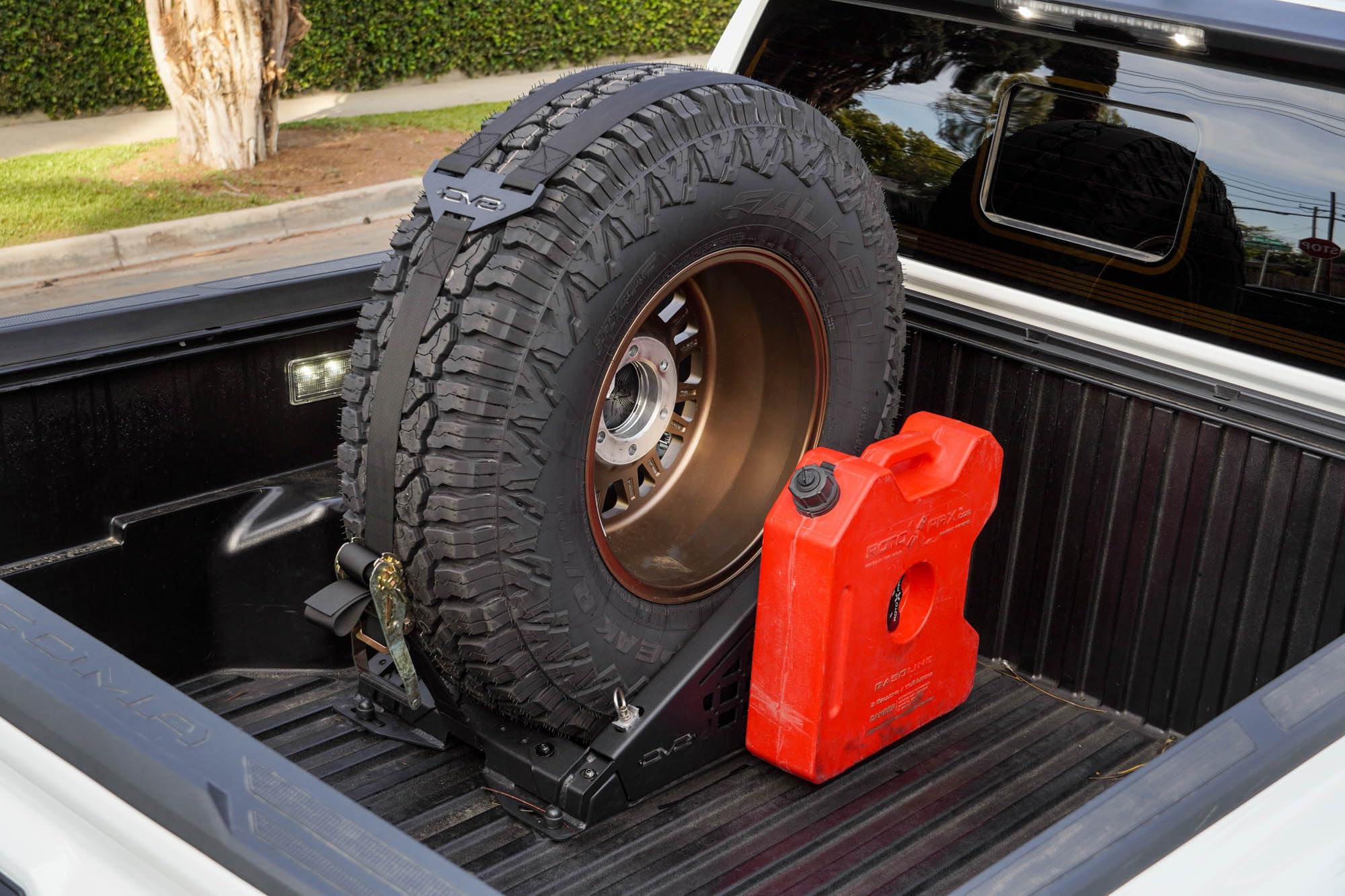 Offroad DV8 Truck Bed Universal Tire Carrier & Accessory Mount | Featured Side Molle Panels for Mounting Gear & Supplies | Adjustable for Carrying Various Sized Tires and Bikes | Powder Coated Finish