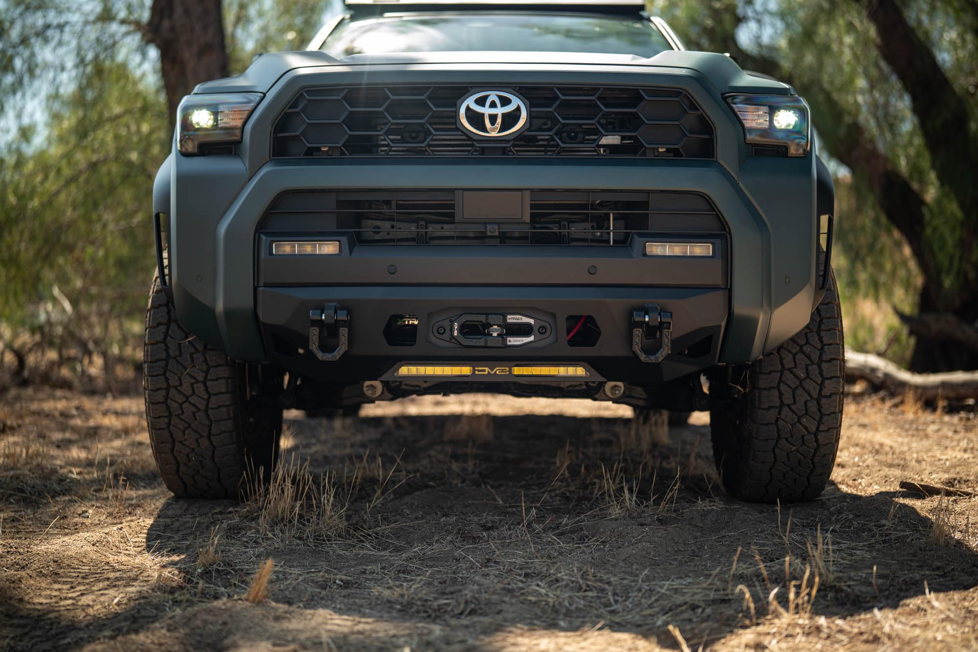 Centric Winch Front Bumper DV8 Offroad for 2025 Toyota 4Runner | Winch Mount | 20" Single Row Light Bar Mount | Pair of 3" Pod Light Mounts | (2) 1" Thick D-Ring Mounts | Powder Coated Finish | Steel