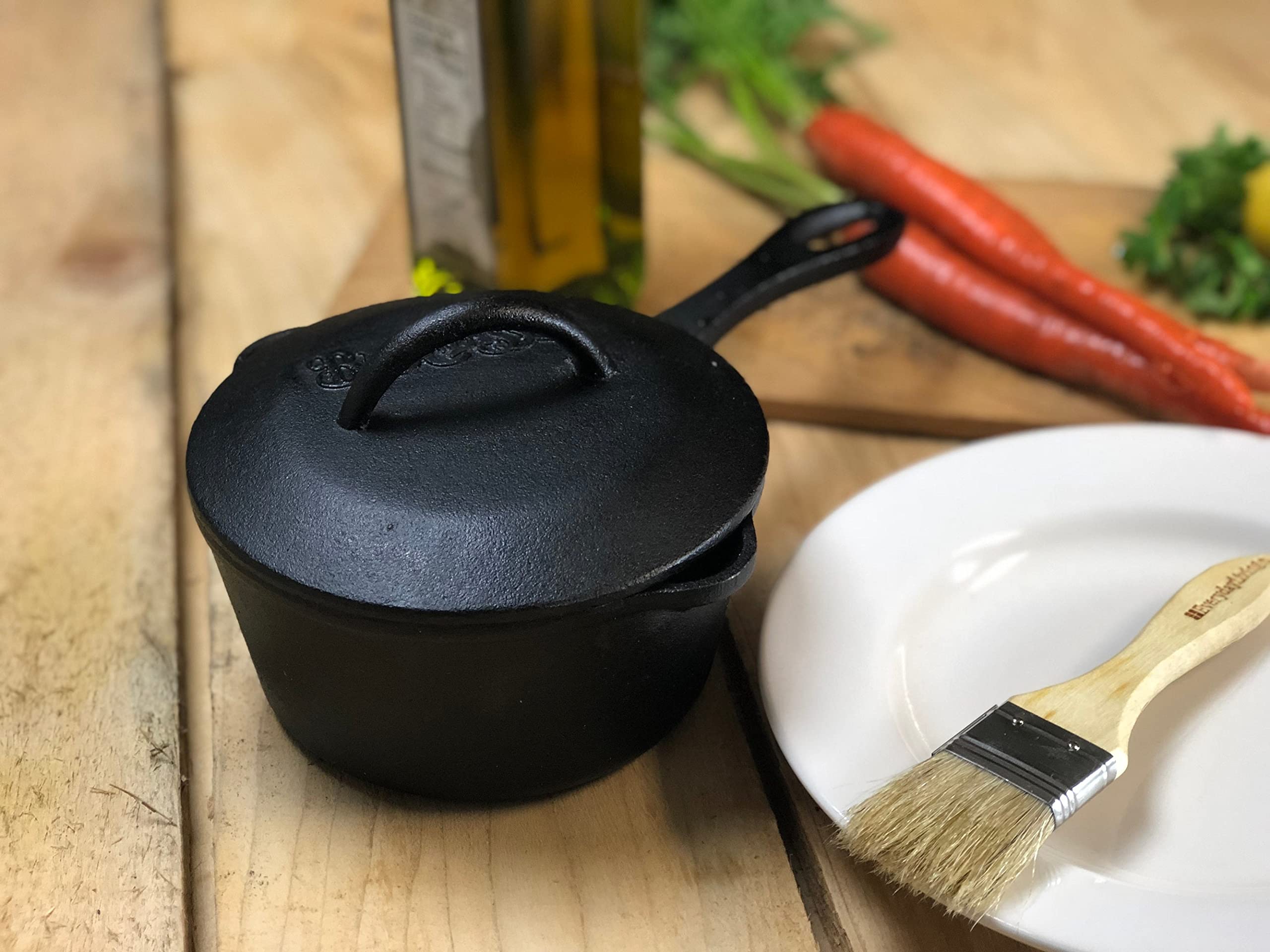 Bayou Classic 7441 Covered 1-qt Cast Iron Sauce Pot Features Self Basting Lid Perfect For Small Portions Reducing Sauces Simmering Soups or Boiling an Egg