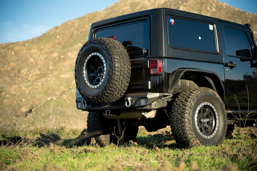 FS-7 Series DV8 Offroad Rear Bumper for the 2007-2018 Jeep Wrangler JK | Jeep Mid-Width Rear Bumper | Compatible with Factory Hitch | Fits up to 37” Spare Tire (Max 4.5” Backspacing Wheels)