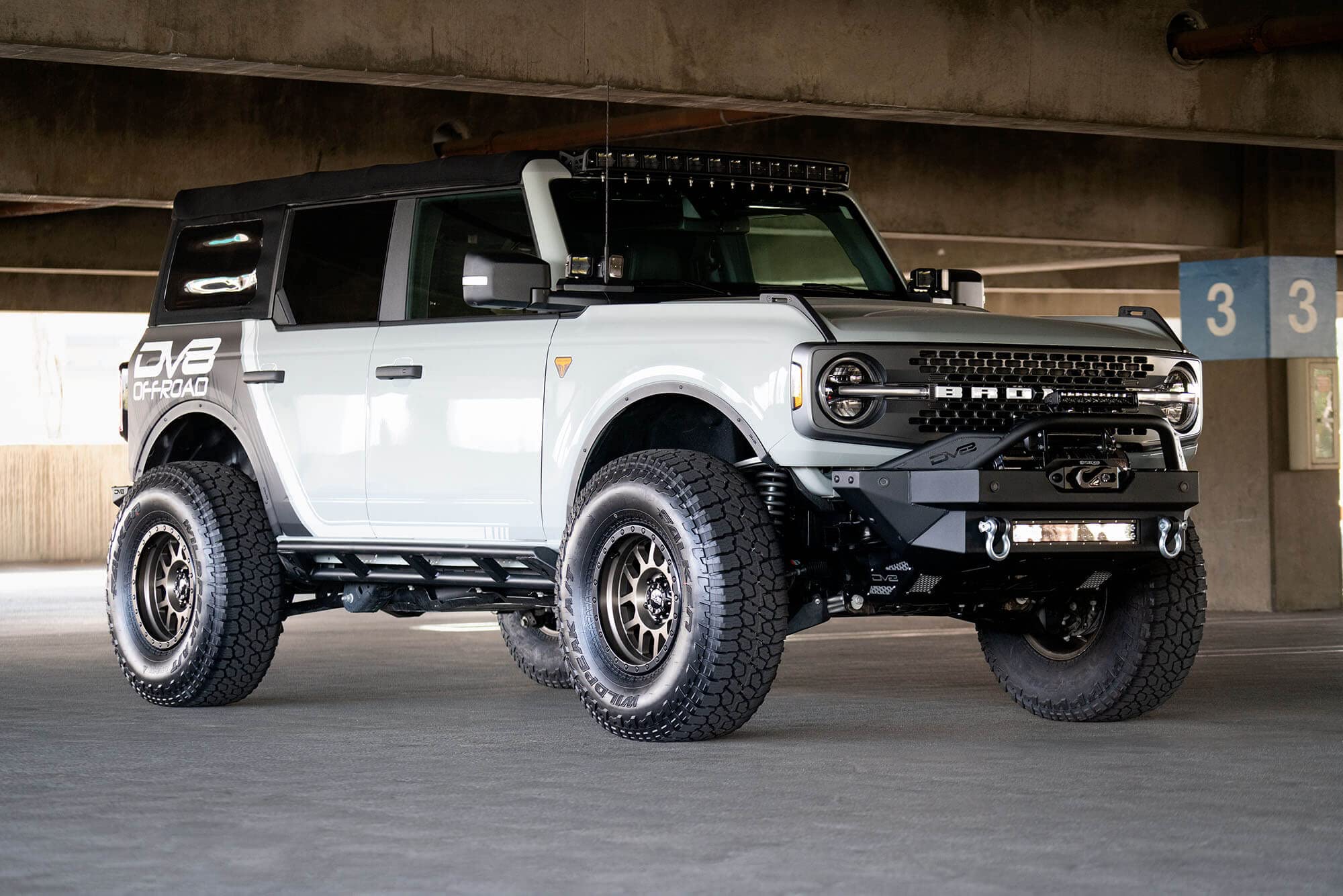 FS-15 Series DV8 Offroad Winch Front Bumper for 2021-2025 Ford Bronco | Works with OEM Parking Sensors | Adjustable Bull Bar Light Tabs | Combine with our Add On Wings & Steel Front Skid Plate