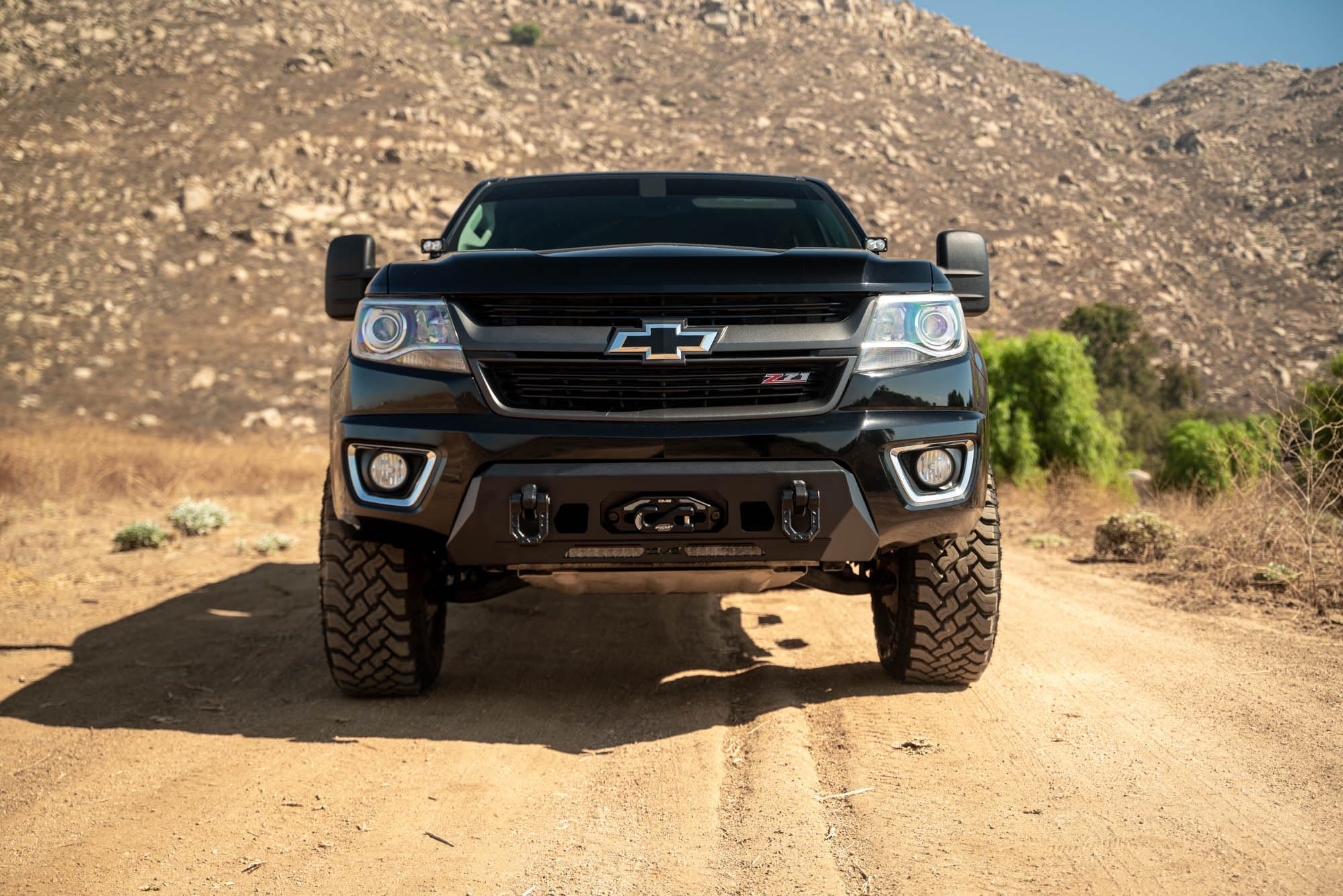 Centric DV8 Offroad Front Bumper for 2015-2020 Chevy Colorado | Center Mount Design | (1) 20" Light Bar Mount | Heavy-Duty Winch Mount | Pair of D-Ring Mounts | (2) 3" Pod Light Mounts | Steel