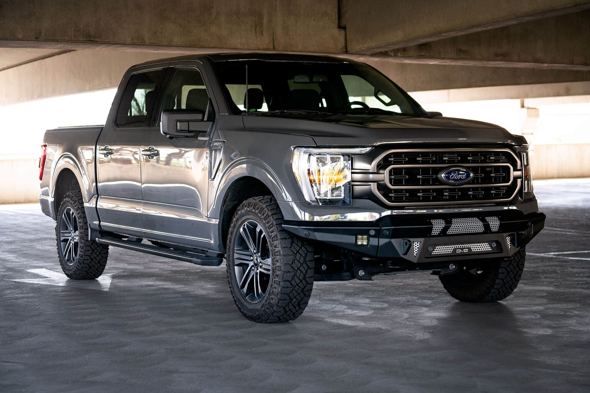 FBFF1-09 | DV8 Offroad | MTO Series Front Bumper for 2021-Current F-150 | 3 Pc Modular Construction | Factory Sensor Compliant | Strategic Airflow Cutouts | LED Light Mounts